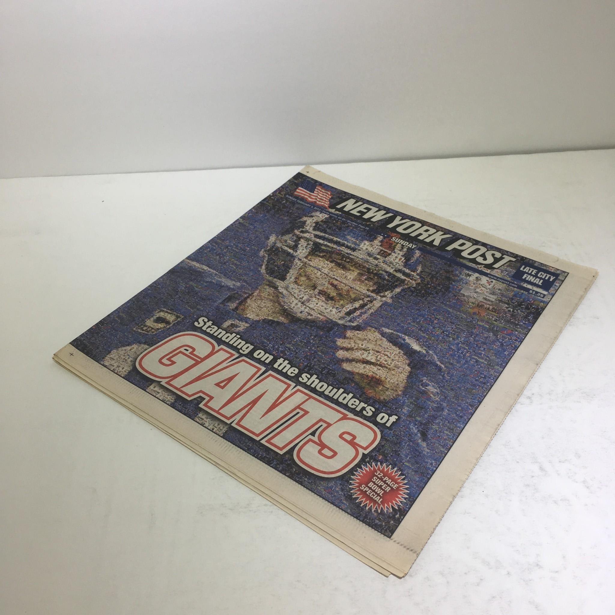 Front cover of the New York Post dated Feb 5 2012, titled 'Standing On The Shoulders Of Giants', showcasing a prominent image of a football player.