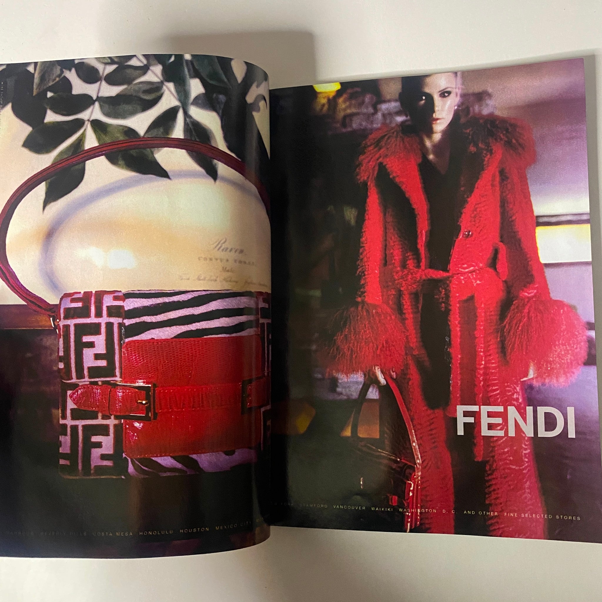 Fashion accessories advertisement in Vogue Magazine August 1997, highlighting Fendi products with vibrant colors and luxury branding.