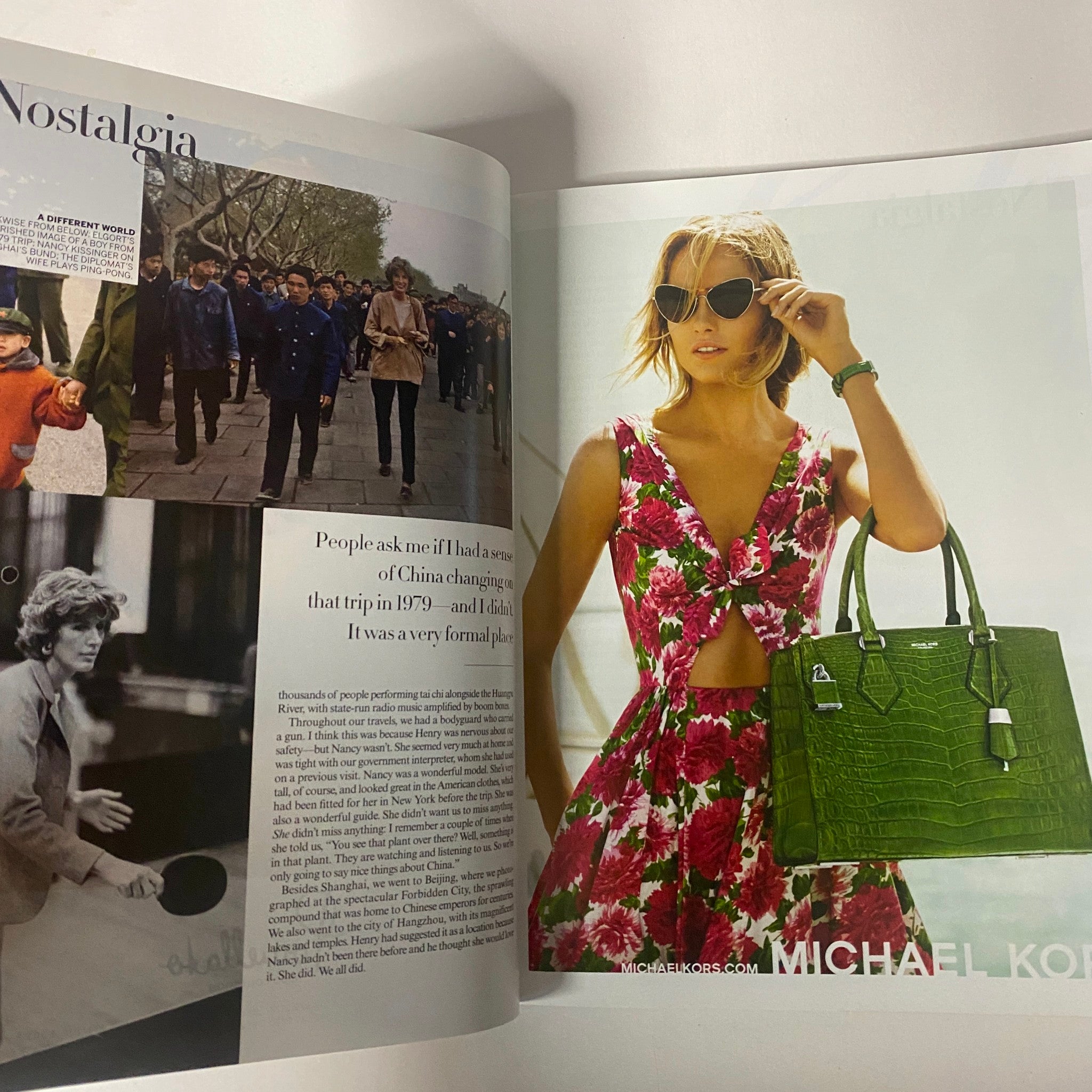 Fashion editorial from Vogue Magazine 2015 displaying a model in a floral dress by Michael Kors, with an article discussing nostalgia in fashion. Vogue Magazine 2015 Rihanna Cover for Met Gala No Label VG.