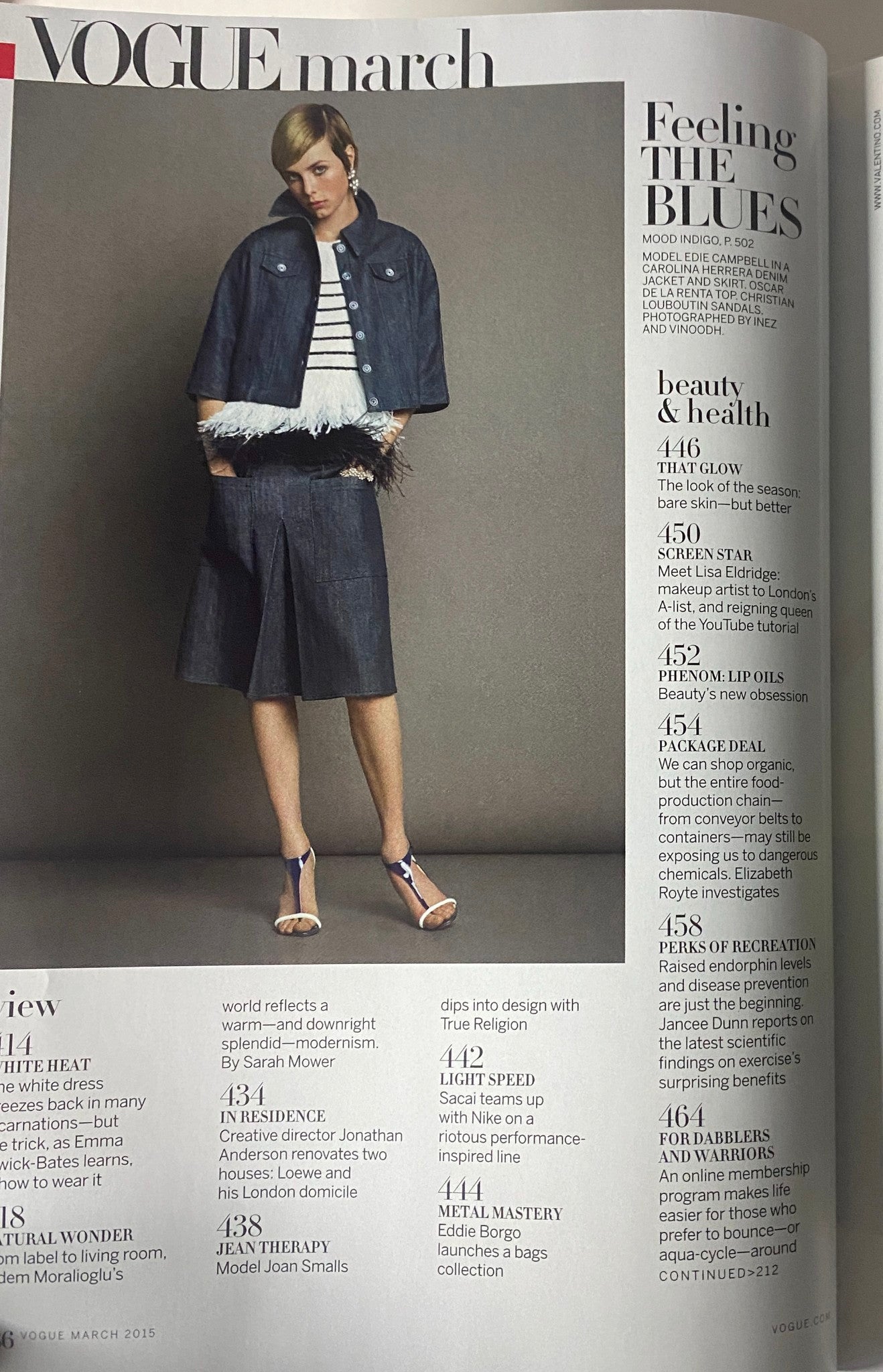 Article from Vogue Magazine March 2015 discussing denim fashion trends, highlighting styles and designers in a feature called 'Feeling the Blues'.