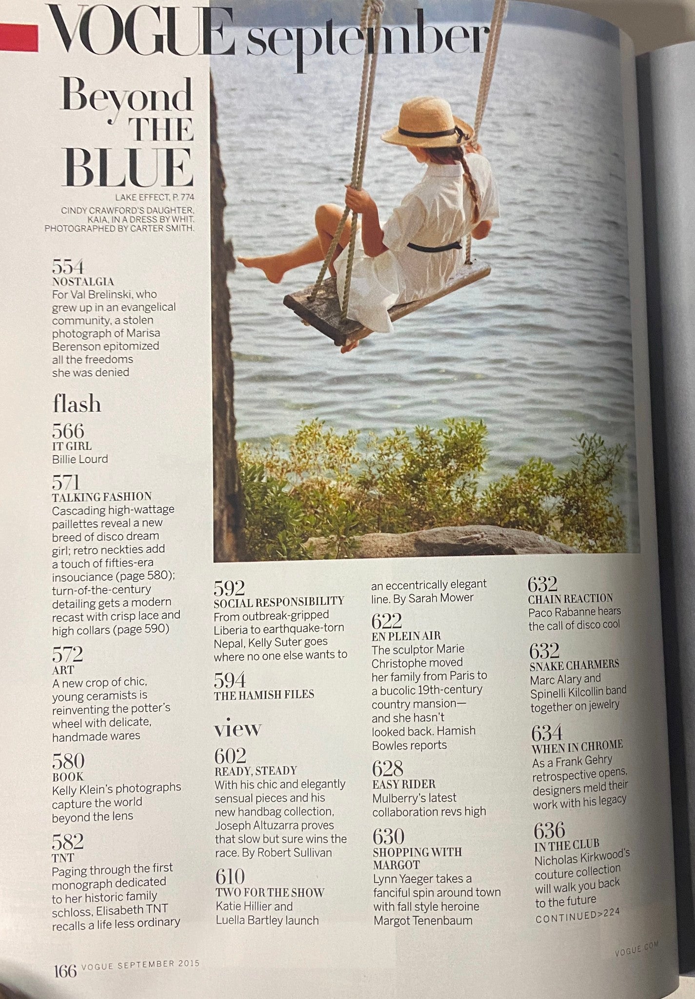 Vogue Magazine September 2015 features a fashion editorial titled 'Beyond the Blue' showcasing Cindy Crawford on vacation, highlighting seasonal beauty trends.