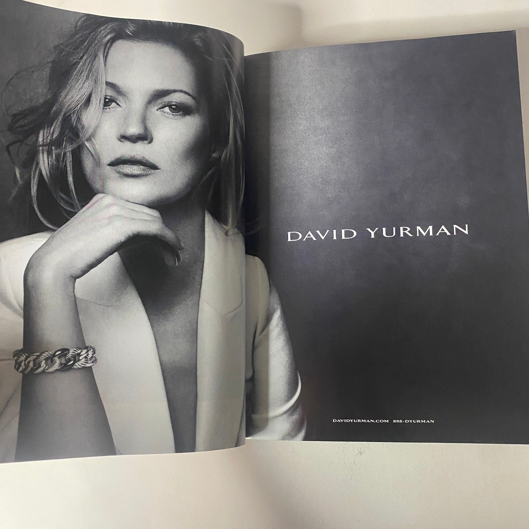 Vogue Magazine September 2015 presents a captivating advertisement for David Yurman, featuring a close-up of a model with elegant jewelry accentuating her look.
