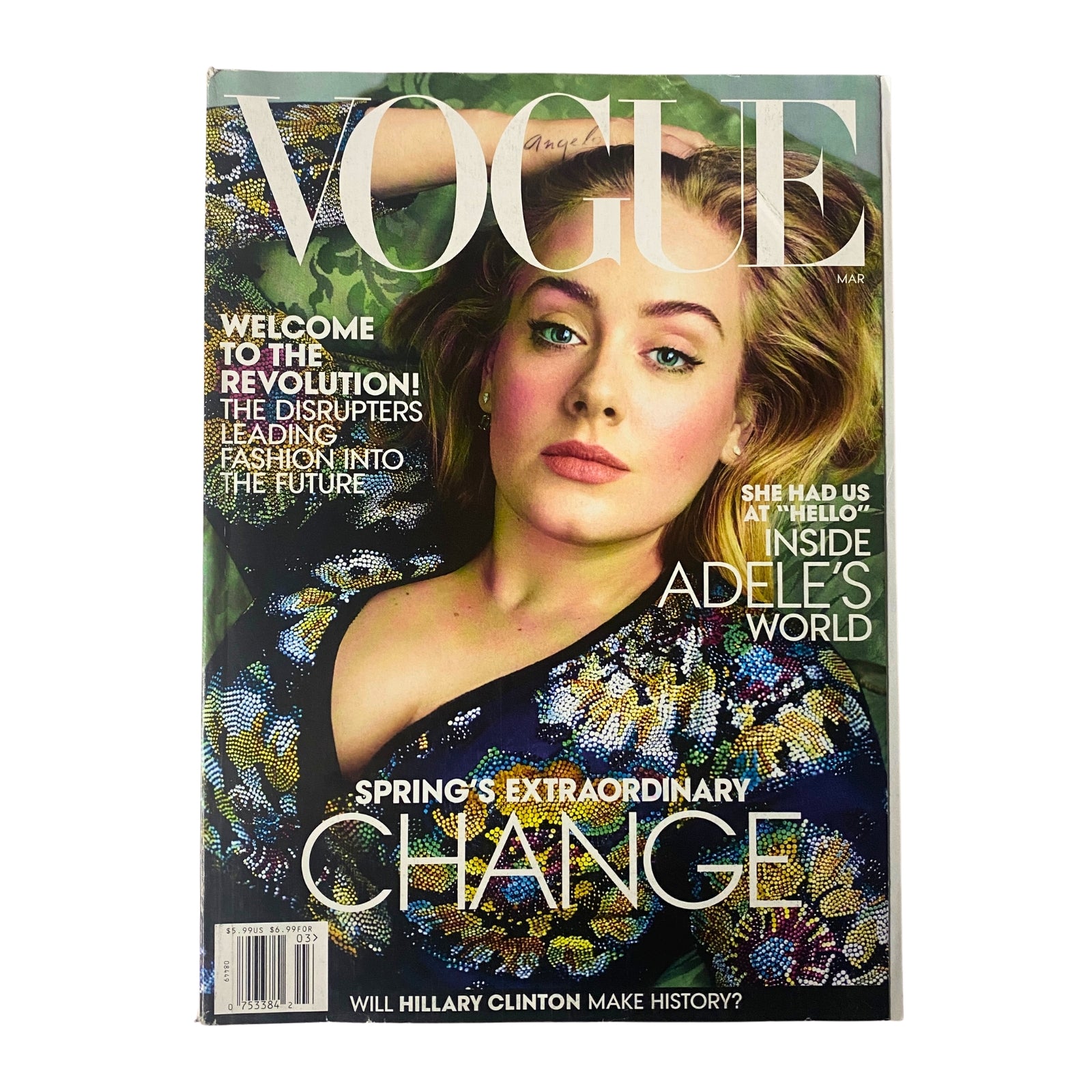 Vogue Magazine March 2016 Adele Cover, featuring a striking image of Adele with an elegant hairstyle and stunning fashion, highlighting her influence in the music industry.