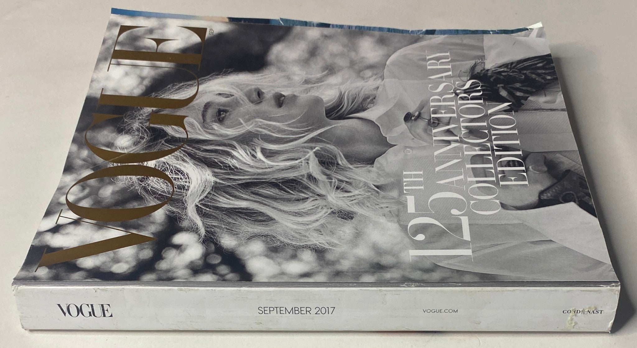 Side view of the Vogue Magazine September 2017 featuring Jennifer Lawrence on the cover. The magazine is titled as the 125th Anniversary Collector's Edition, providing a glimpse of its spine and cover design.