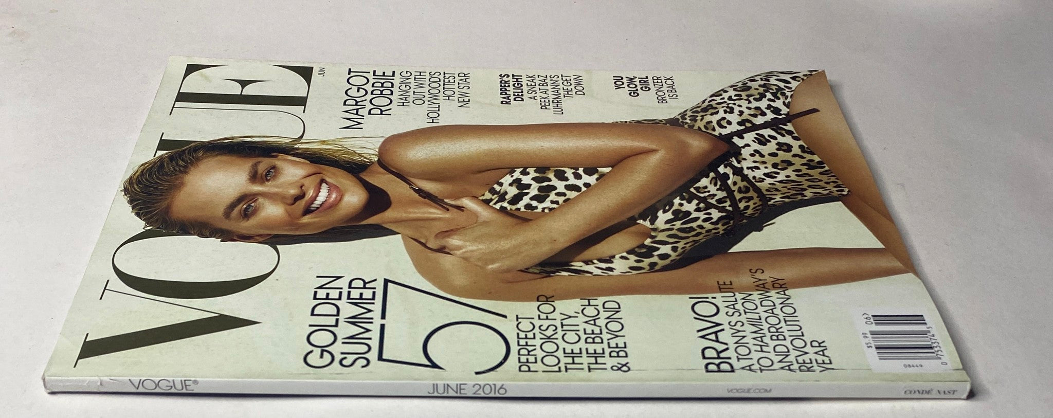 Vogue Magazine June 2016 showcasing Margot Robbie on the cover, emphasizing 'Golden Summer' fashion themes and beauty trends.