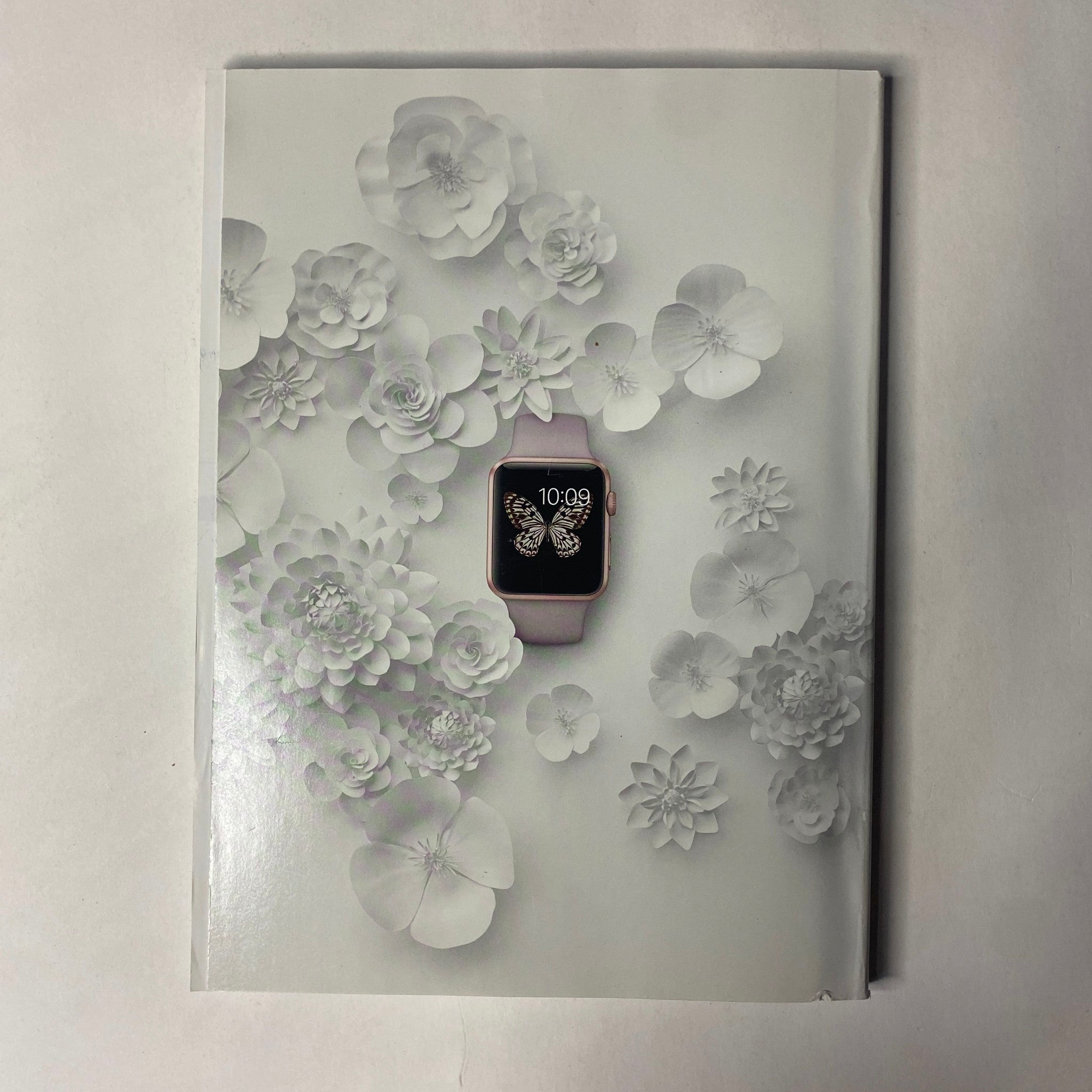 Vogue Magazine April 2016 Rihanna Cover No Label VG showcasing a minimalist floral design with an Apple Watch, emphasizing elegance and contemporary fashion.