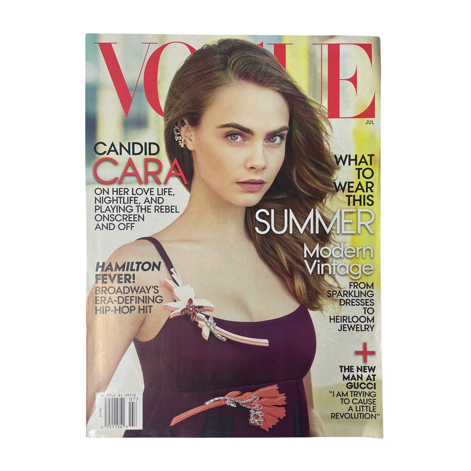 Vogue Magazine July 2015 Cover featuring Cara Delevingne in very good condition. Highlights the transition of Cara Delevingne from model to actress with a focus on fashion and summer style.