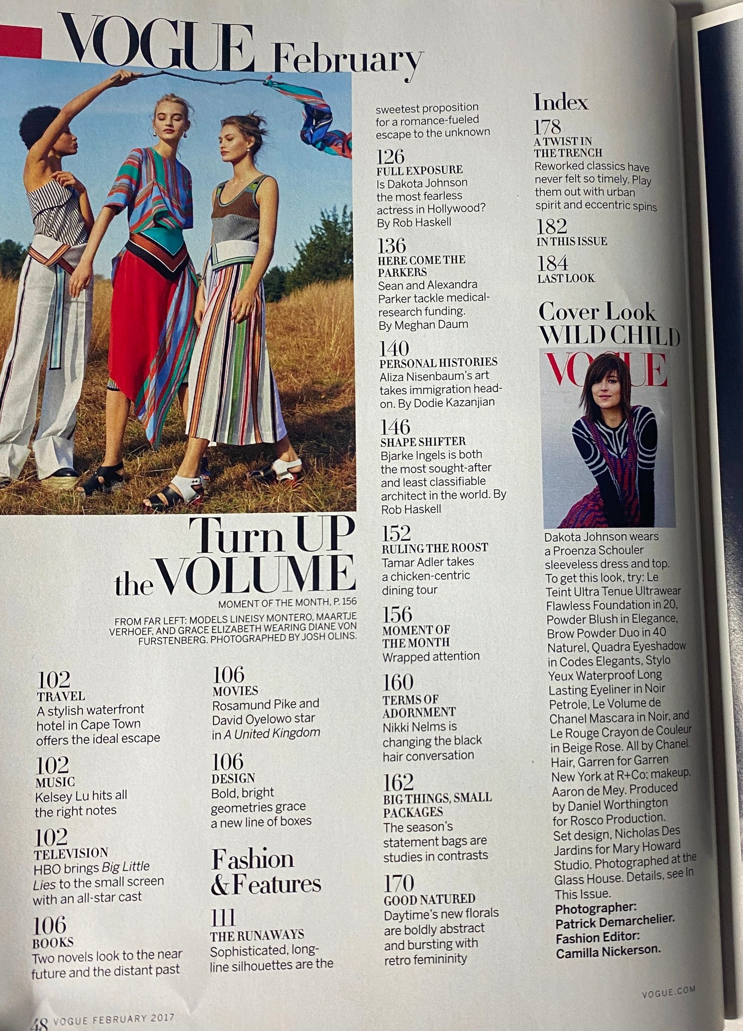 Vogue Magazine February 2017 Dakota Johnson Cover featuring a fashion spread with bold colors and patterns. The table of contents highlights notable articles and features.