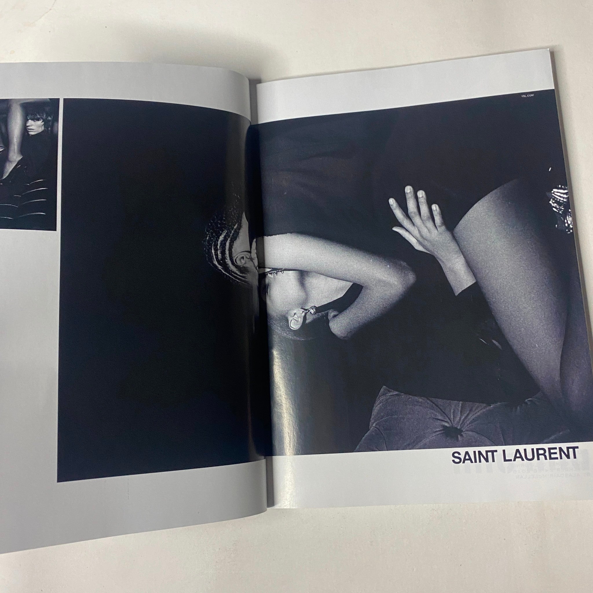 Inside Vogue Magazine February 2017 showcasing a stunning fashion editorial from Saint Laurent with a black and white aesthetic.