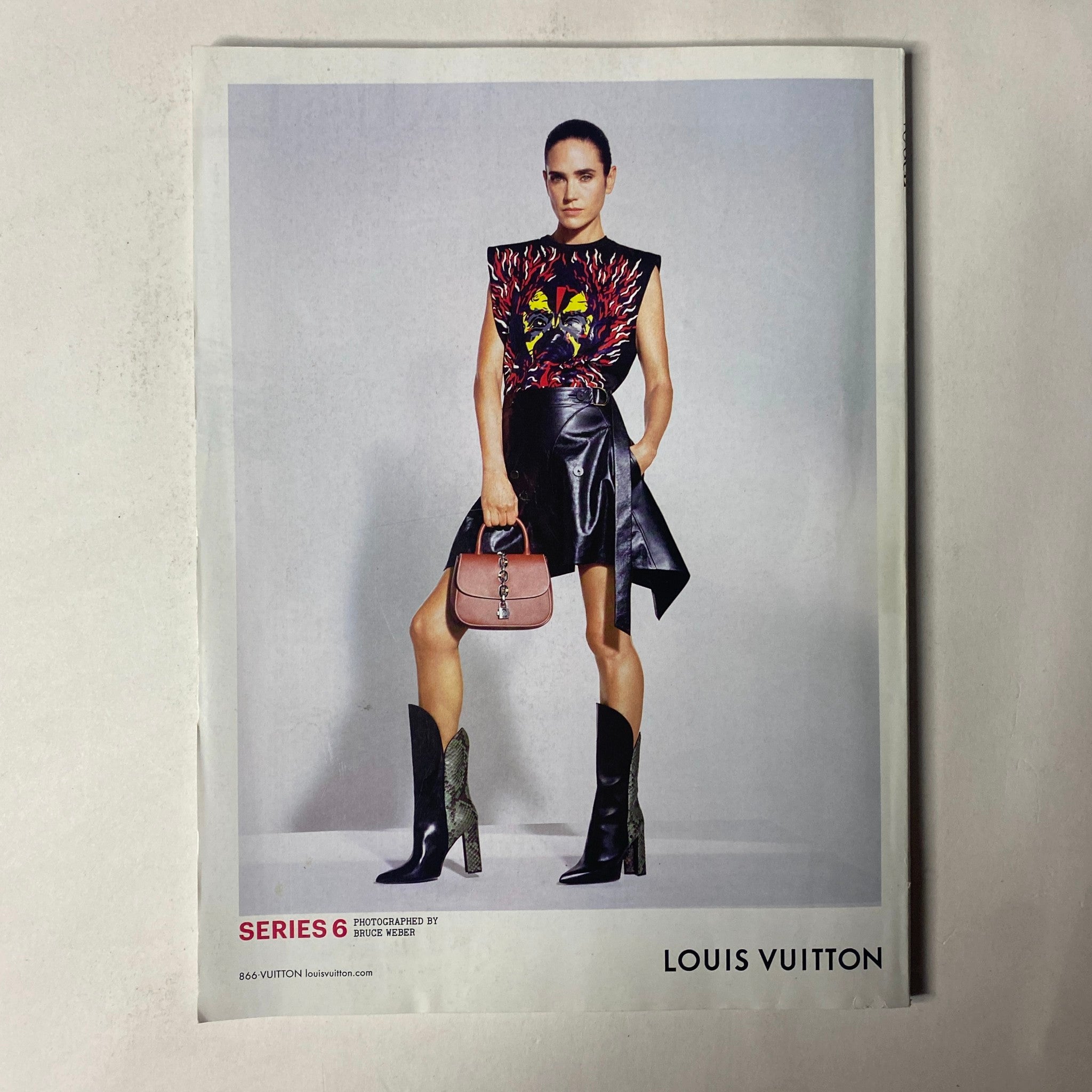Vogue Magazine February 2017 Dakota Johnson Cover presents a striking Louis Vuitton campaign image featuring a model in a vibrant and fashionable outfit.
