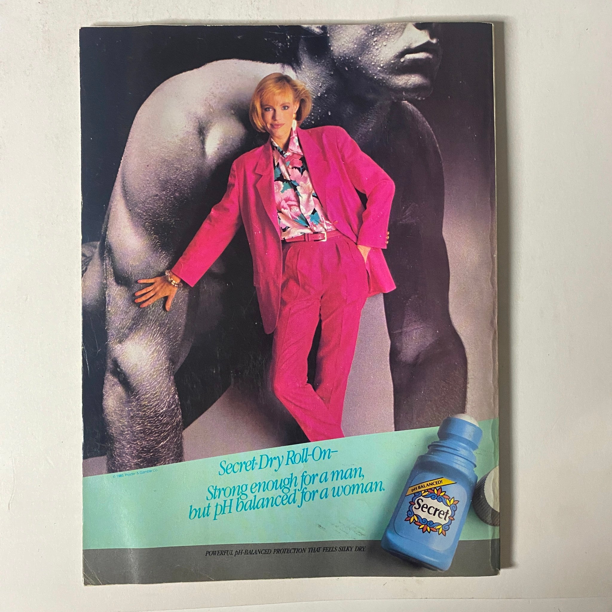 Back cover of Seventeen Magazine June 1986 featuring a model in pink suit promoting Secret Dry Roll-On, emphasizing fashion and personal care. Title: 'Seventeen Magazine June 1986 Sun-Worshiper Tina Cover No Label'.
