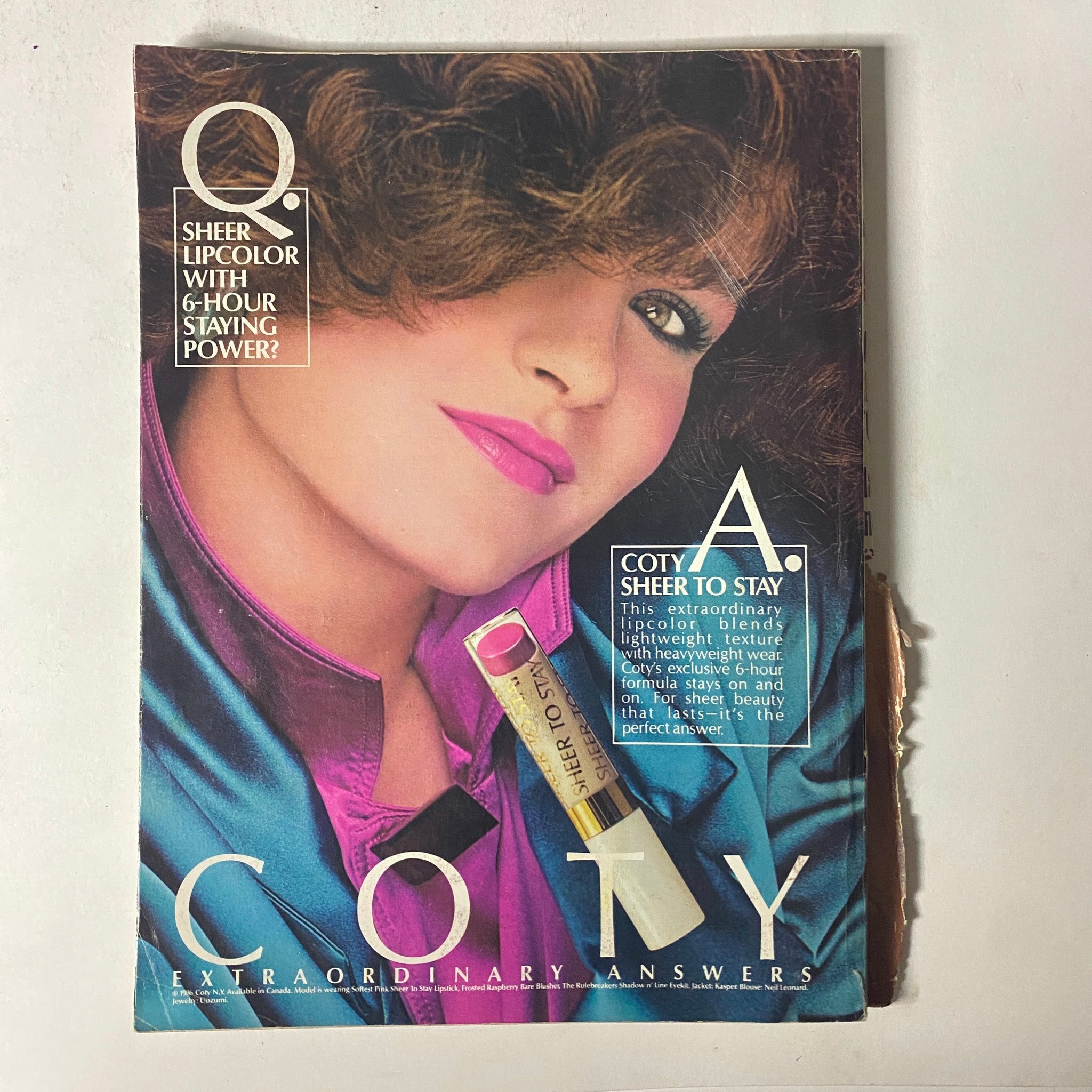 Beauty advertisement for Coty cosmetics showcasing sheer lipcolor in Seventeen Magazine September 1986, with an emphasis on long-lasting beauty.