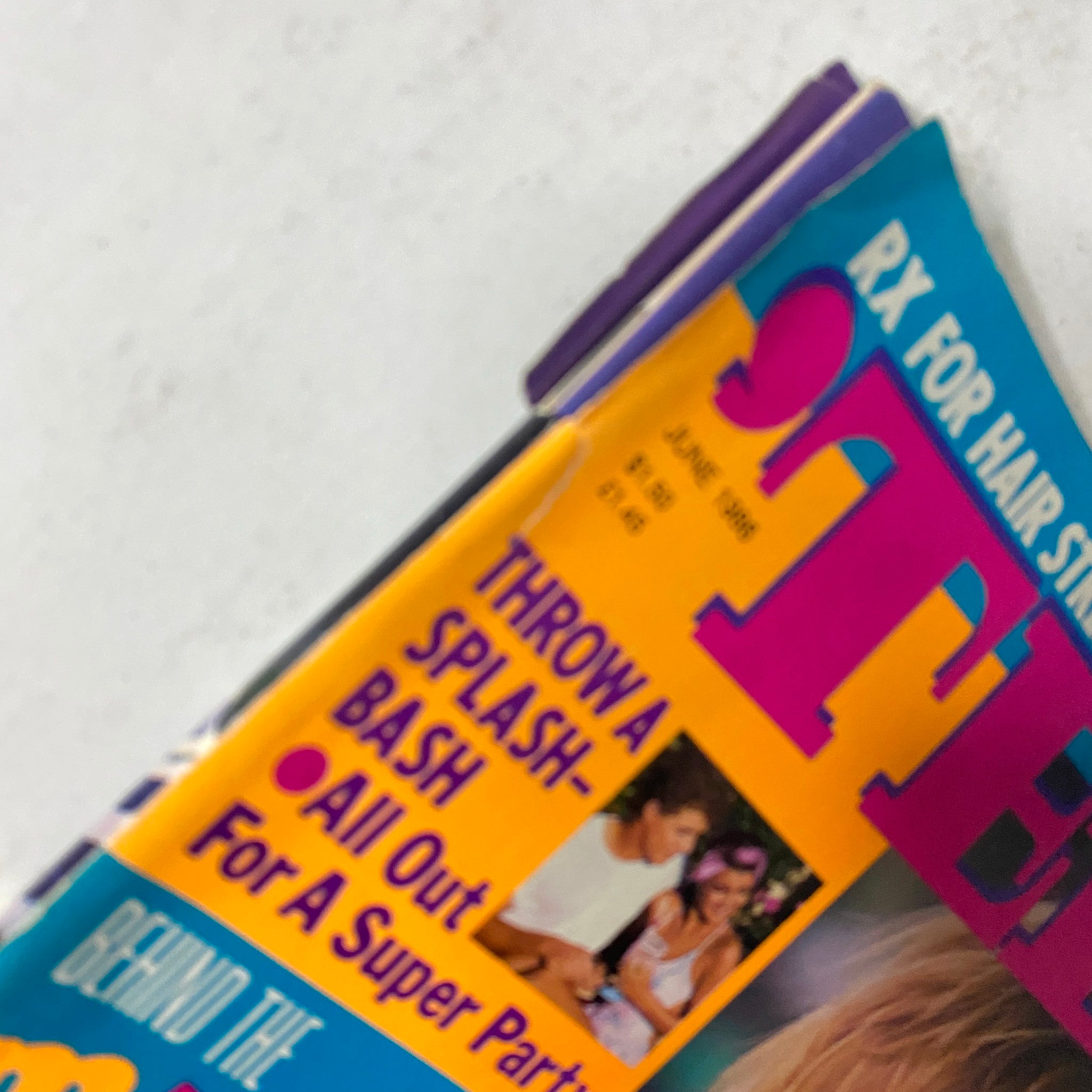 Close-up of the corner of 'Teen Magazine June 1986 Vol 30 No. 6' showing the magazine's logo and headlines about summer party strategies.