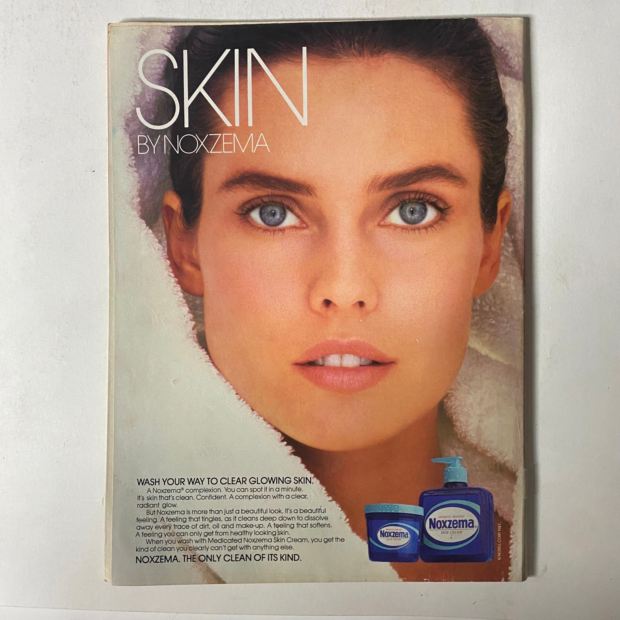 Promotional page for Noxzema from Teen Magazine April 1987 Vol 31 No. 4, featuring a woman with clear skin and product information.
