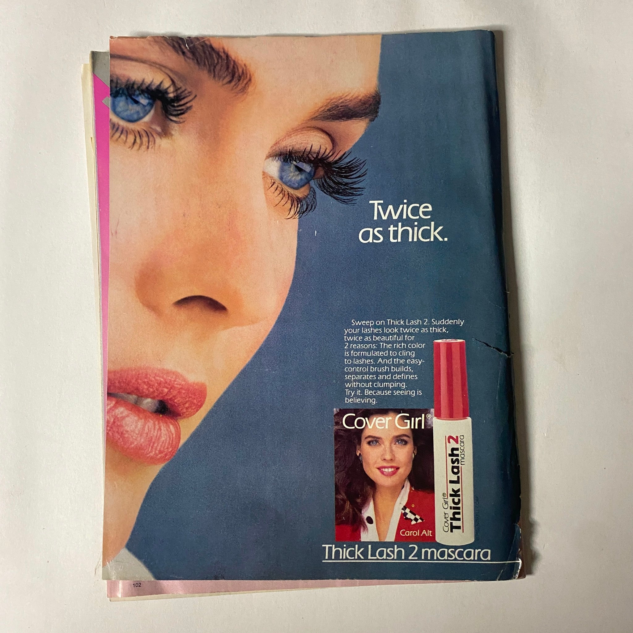 Advertisement for Cover Girl's Thick Lash 2 mascara in the February 1987 Teen Magazine, displaying a model's long lashes and beauty product.