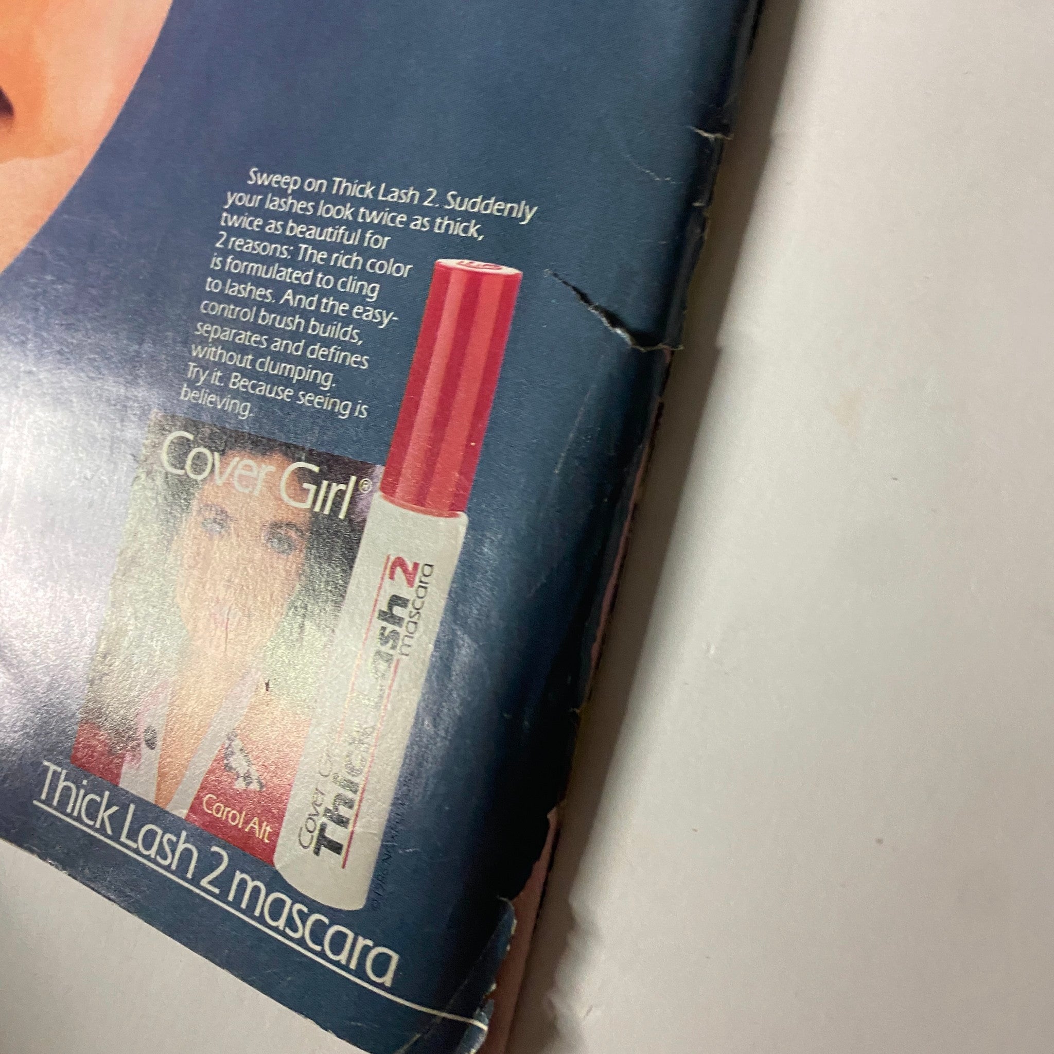 Close-up view of the Thick Lash 2 mascara advertisement from Teen Magazine February 1987, highlighting its effectiveness in enhancing eyelashes.