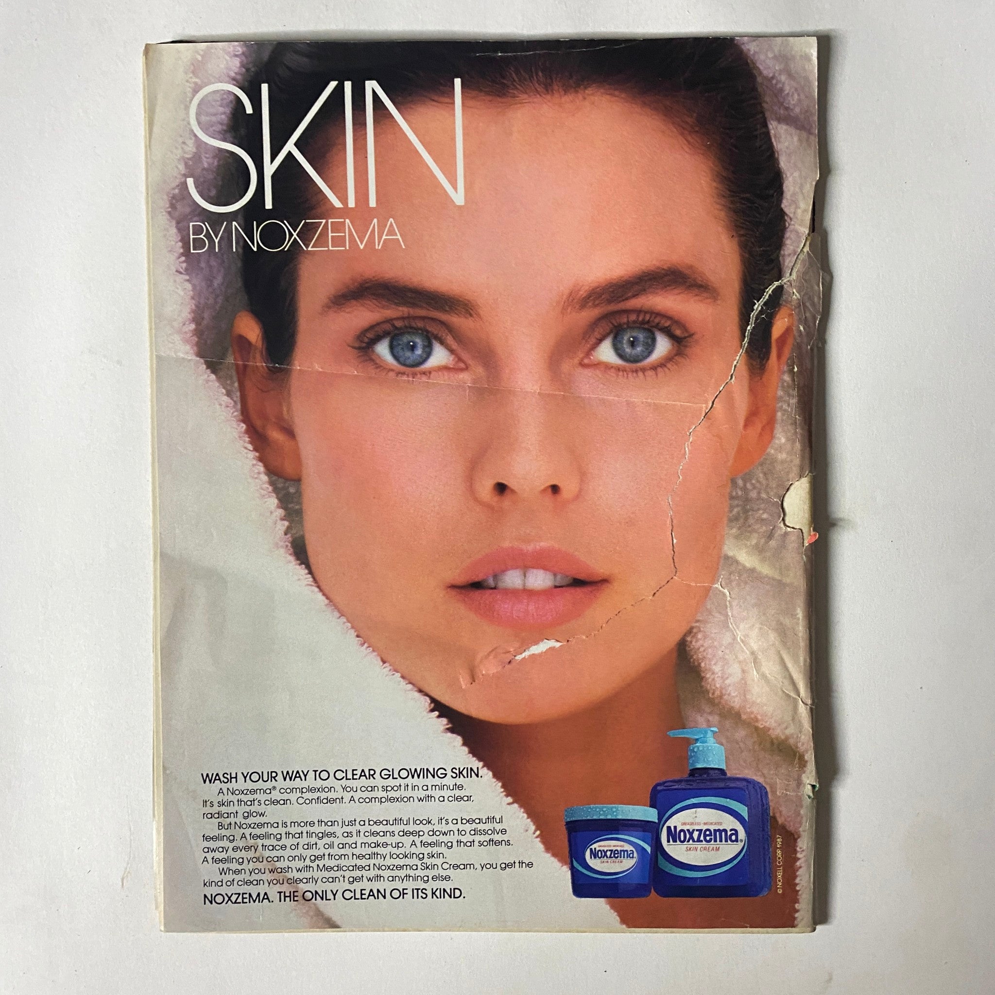 Cover of the Teen Magazine May 1987 featuring a beauty advertisement for Noxzema skincare, showcasing a model with glowing skin. The image contains visible tears and creases.