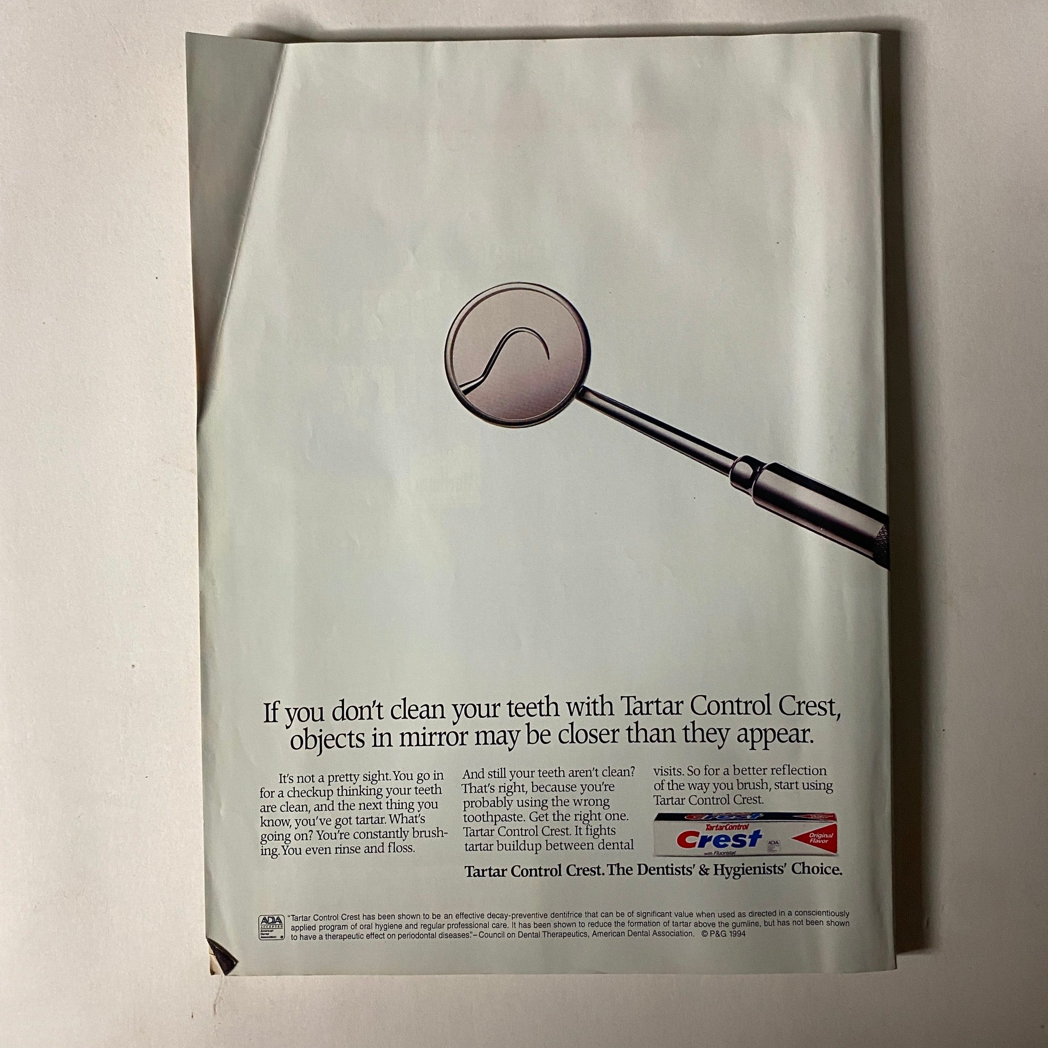 Back cover of Cosmopolitan Magazine January 1996, displaying an advertisement for Crest toothpaste, emphasizing dental care and hygiene.