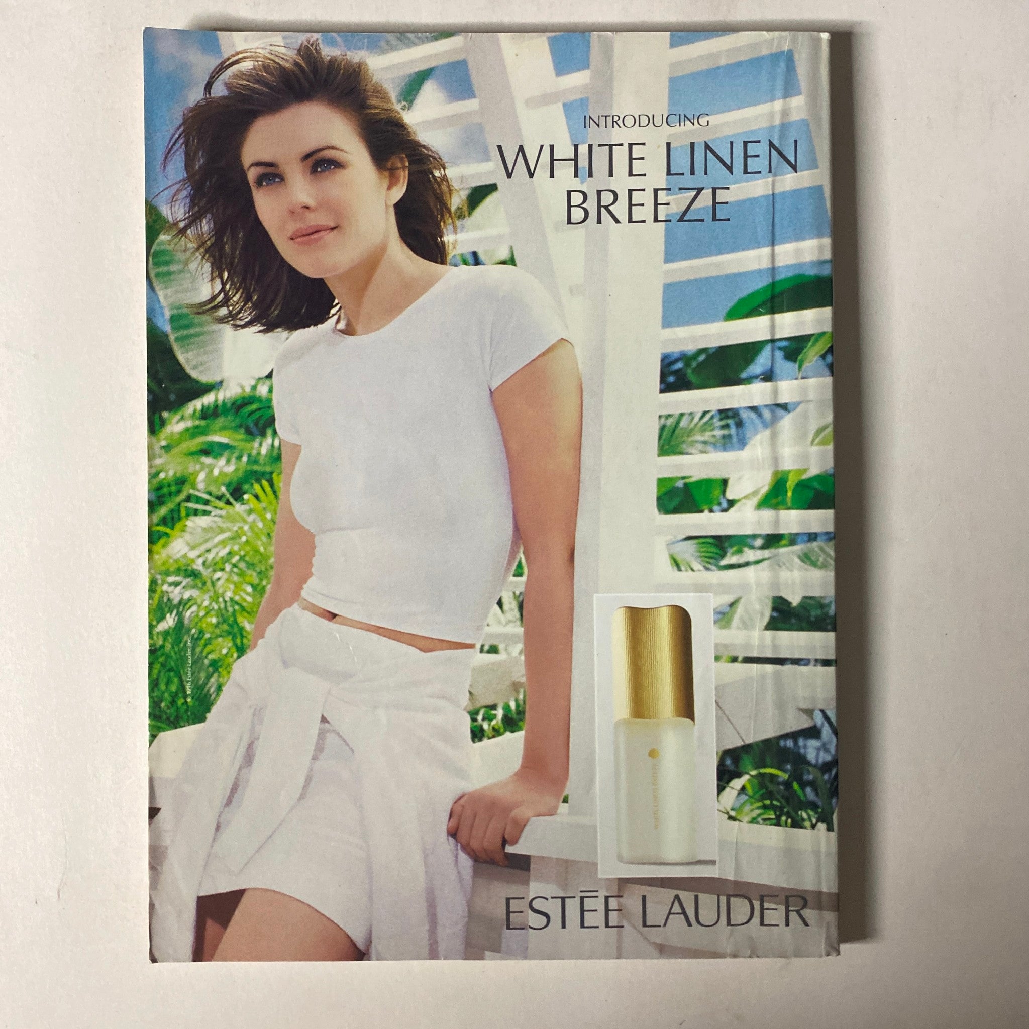 Promotional page for Estee Lauder's White Linen Breeze perfume, featured in the Cosmopolitan Magazine July 1996 issue.