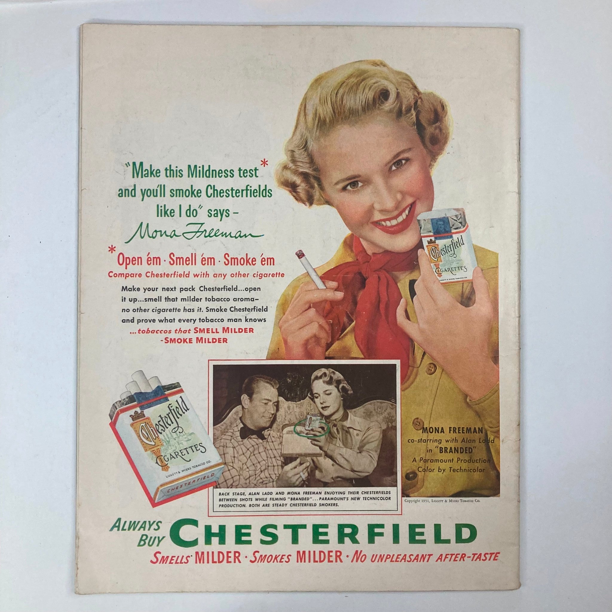 Vintage advertisement in Collier's Magazine January 6 1951 featuring a smiling woman promoting Chesterfield cigarettes, emphasizing the mildness test with the tagline 'Always Buy Chesterfield'.