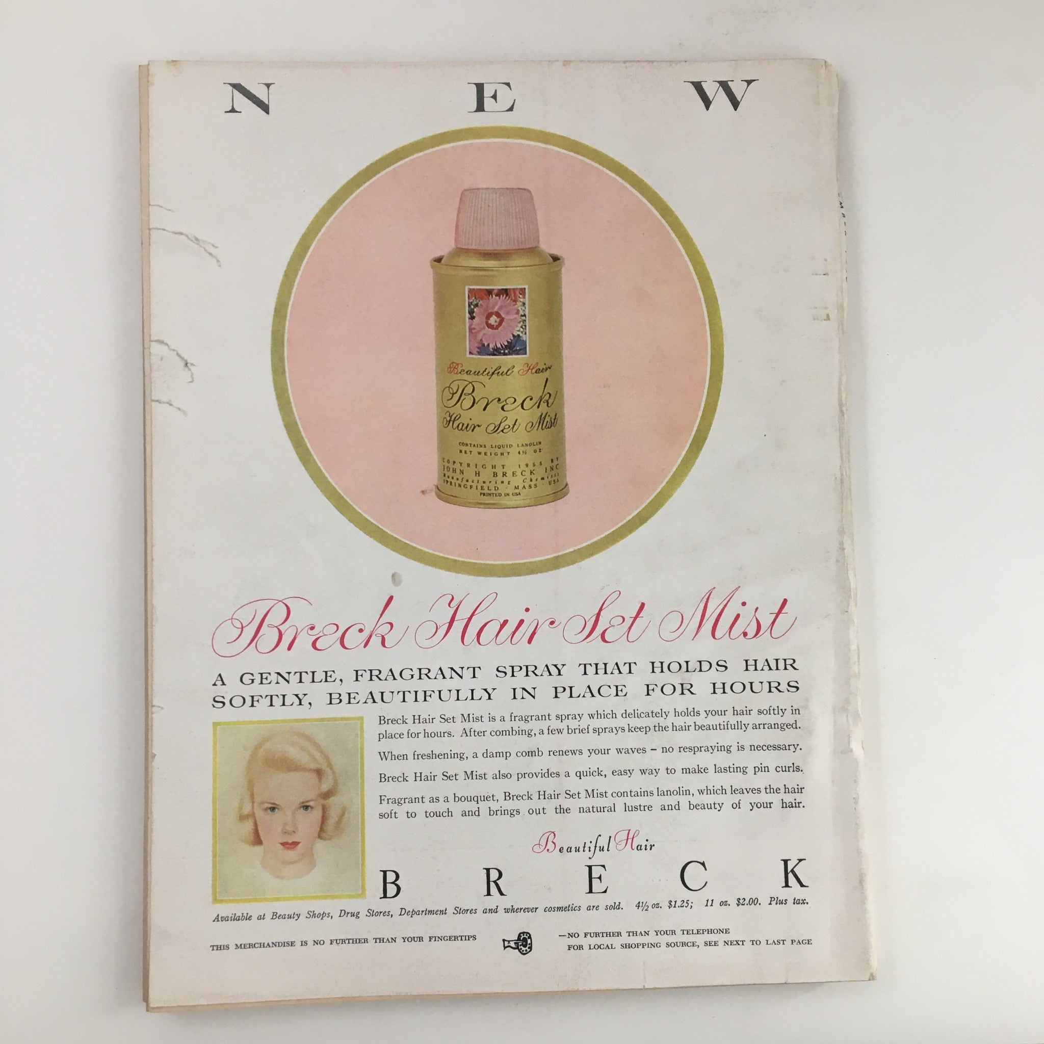 Back cover of Charm Magazine September 1956 featuring an advertisement for Breck Hair Set Mist, promoting a fragrant hair care product.