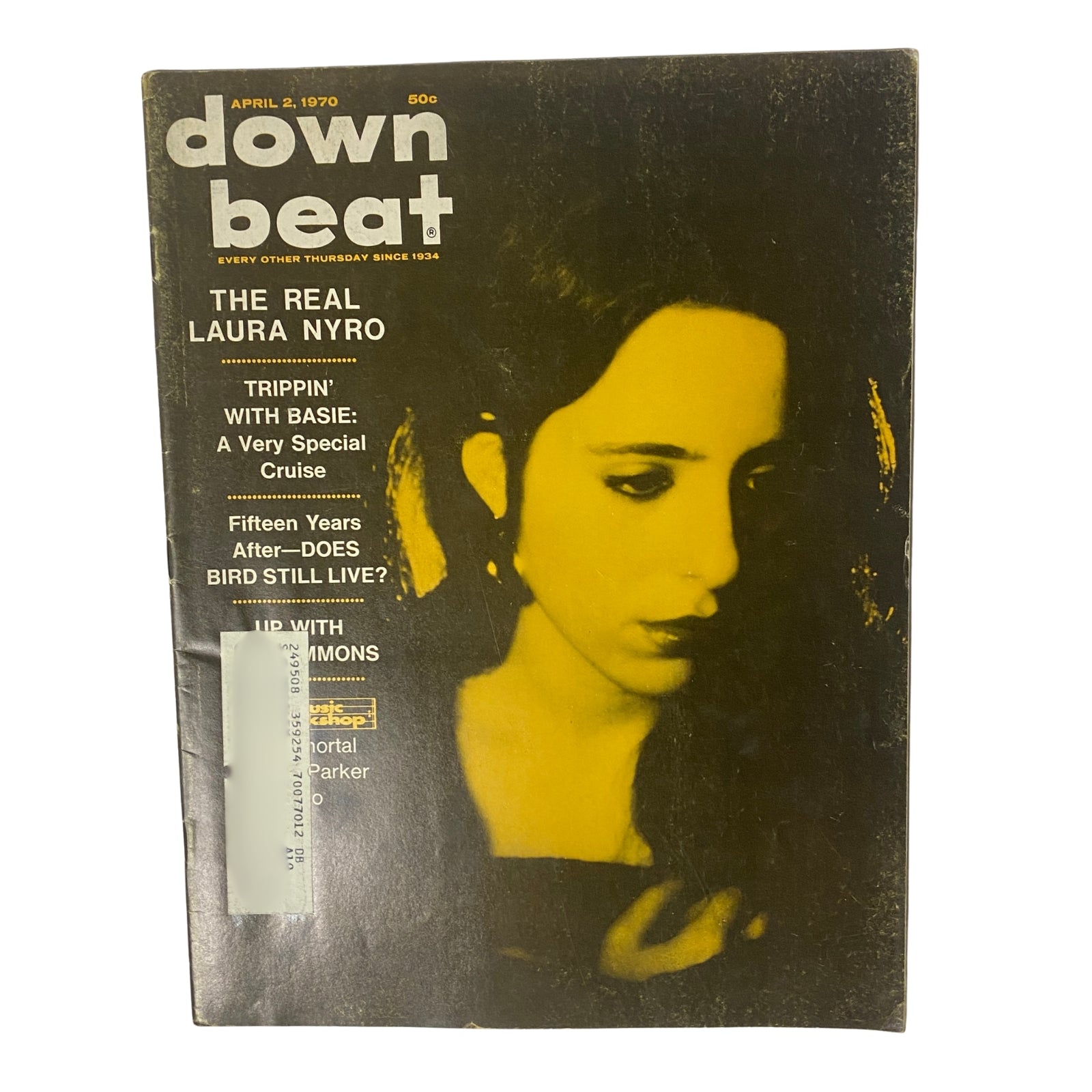 Cover of Down Beat Magazine, April 2, 1970, featuring the headline 'The Real Laura Nyro' with a monochrome image and vibrant layout.