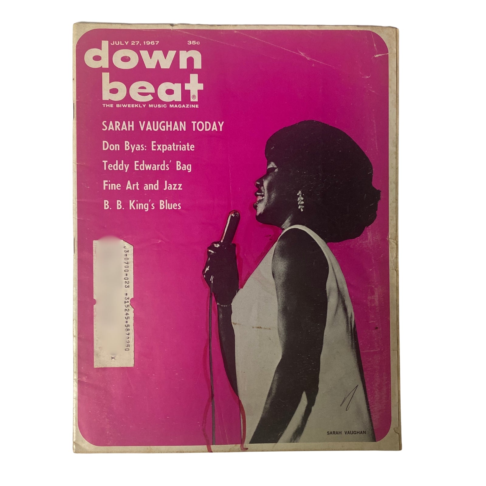 Cover of Down Beat Magazine, July 27, 1967 Vol 34 No 15 featuring jazz vocalist Sarah Vaughan in a profile pose. The cover highlights stories on Don Byas, Teddy Edwards, and B.B. King's Blues.