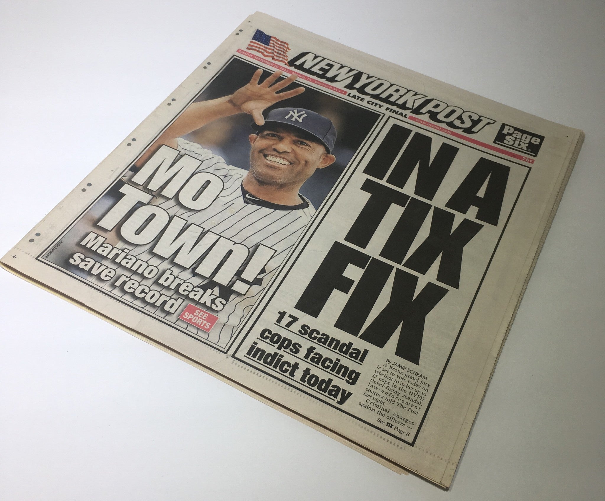 New York Post front page displaying Mariano Rivera waving with the title 'Mo Town! IN A TIX FIX 17 scandal cops facing indict today', dated September 20, 2011.