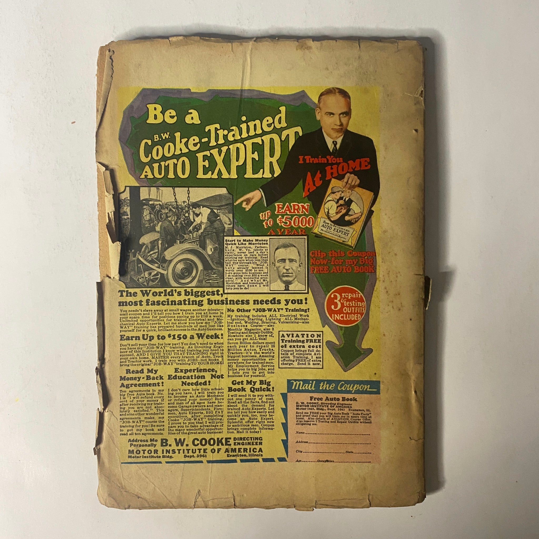 Back cover of The Popular Magazine, March 1930, advertising B.W. Cooke's auto training program with colorful graphics and vintage design.