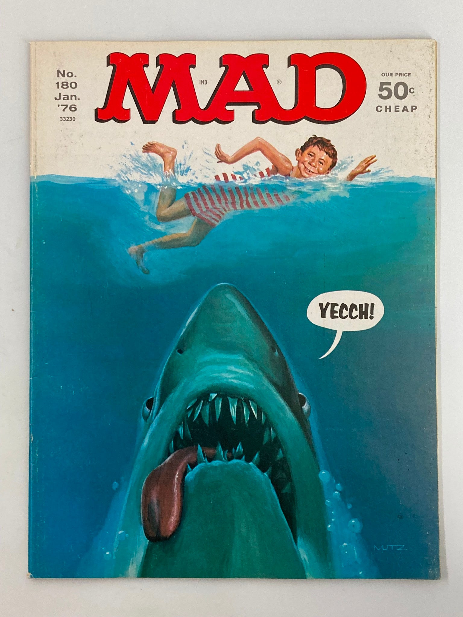 Cover of Mad Magazine, January 1976, Issue No. 180, featuring a satire of Jaws, in very good condition (4.0 VG)