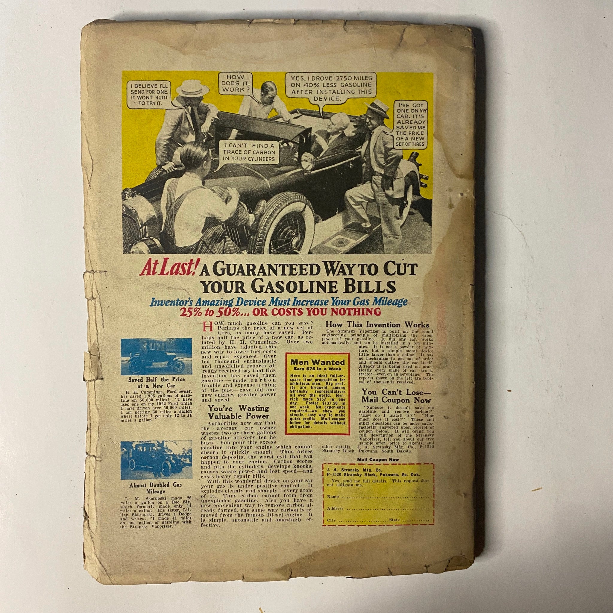 Back cover of Western Story Magazine, November 19, 1927, displaying an advertisement for a gasoline-saving device along with a car image.