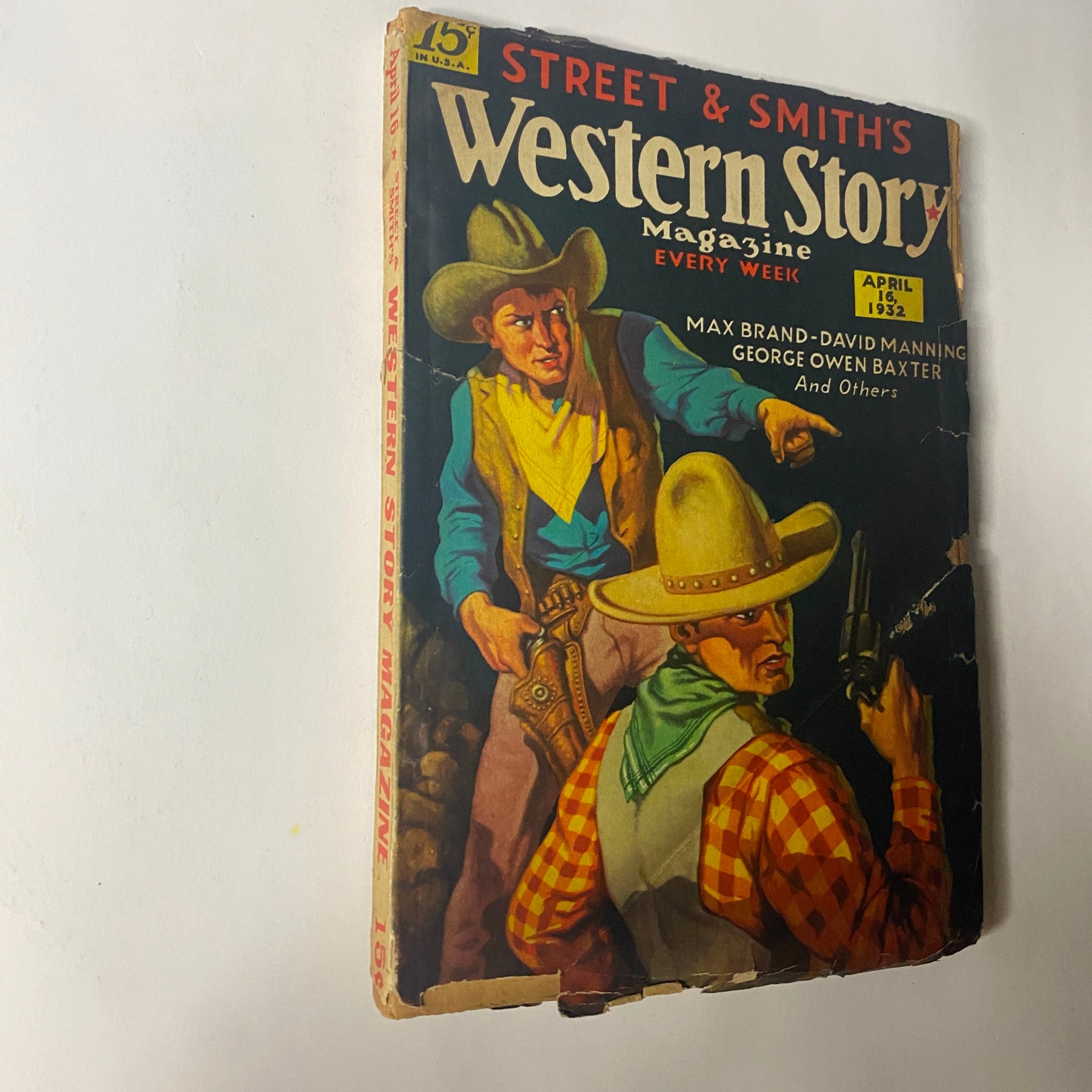 Alternative view of the cover of Western Story Magazine, April 16, 1932, titled 'Red Rock's Secret', featuring two cowboys with pistols against a backdrop of the American West.