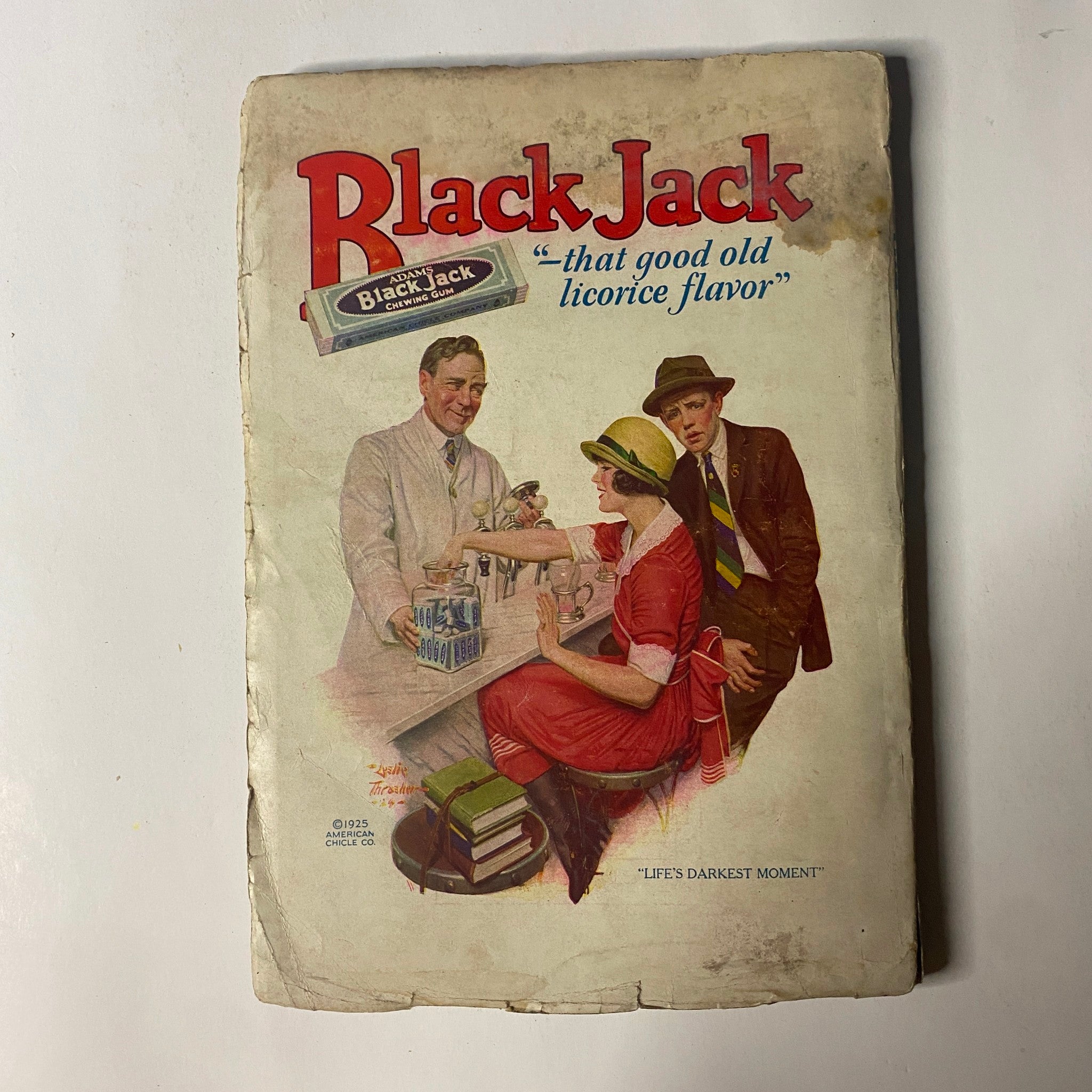 Cover of a vintage advertisement for Black Jack gum, featuring a colorful illustration of a man and a woman at a table with a product display, capturing the nostalgia of early 20th-century Americana.