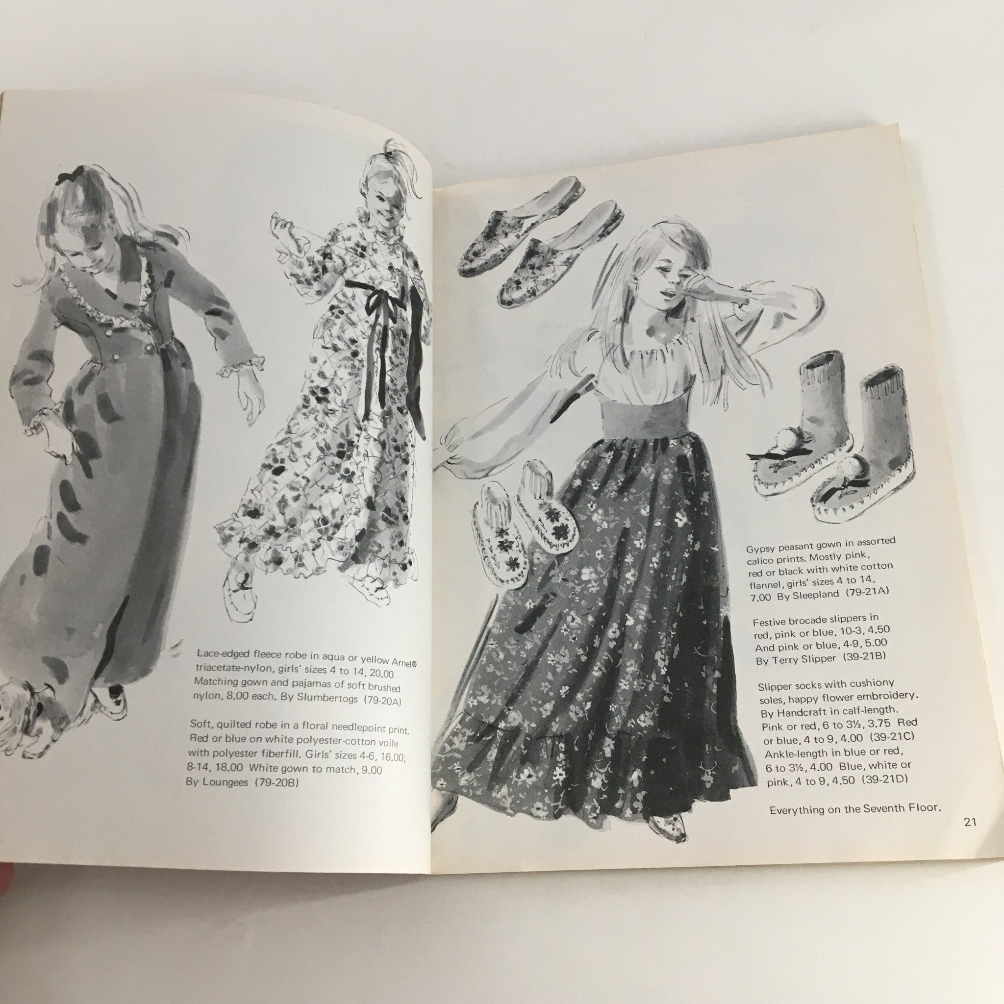 Fashion illustrations depicting women's stylish outfits from the 1970 The Lord and Taylor Christmas Book, highlighting holiday trends.