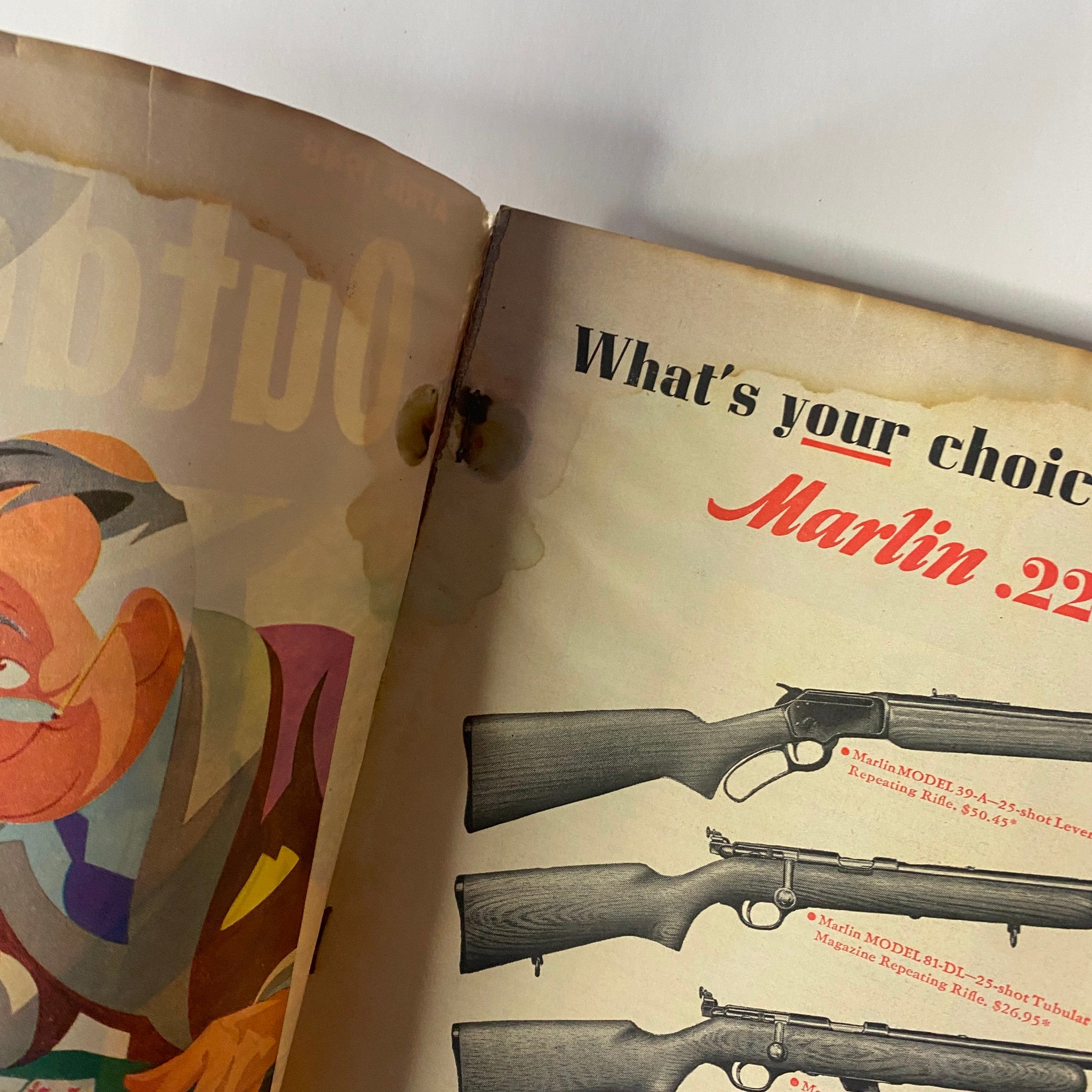 Interior page of Outdoor Life Magazine April 1948, illustrating a colorful advertisement for Marlin 22 rifles, reflecting vintage firearm promotion.
