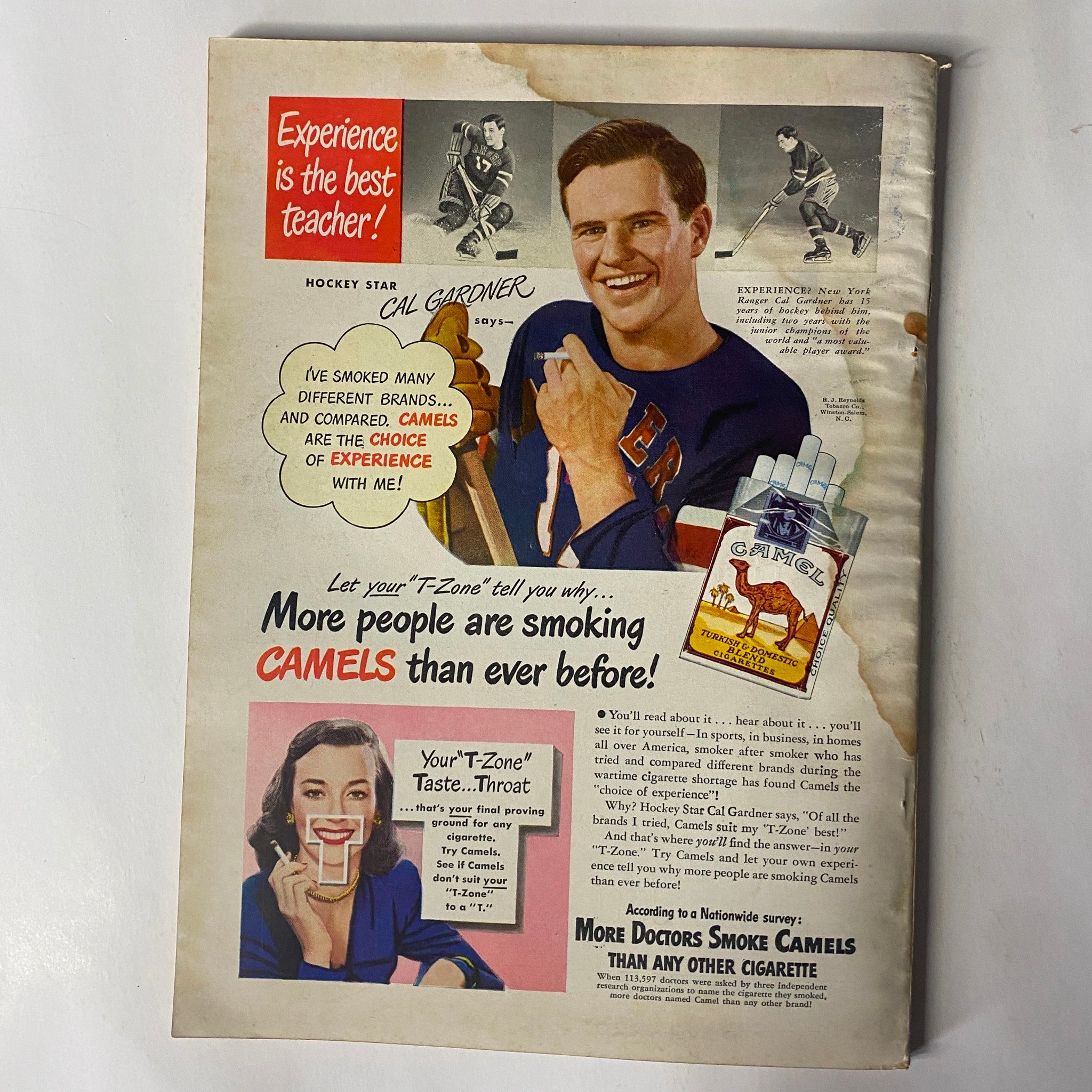 Vintage advertisement from Outdoor Life Magazine February 1948 Cover Painting by Bob Kuhn No Label featuring Cal Gardner promoting Camels cigarettes as 'the choice of experience with me' and highlighting smoking preferences.