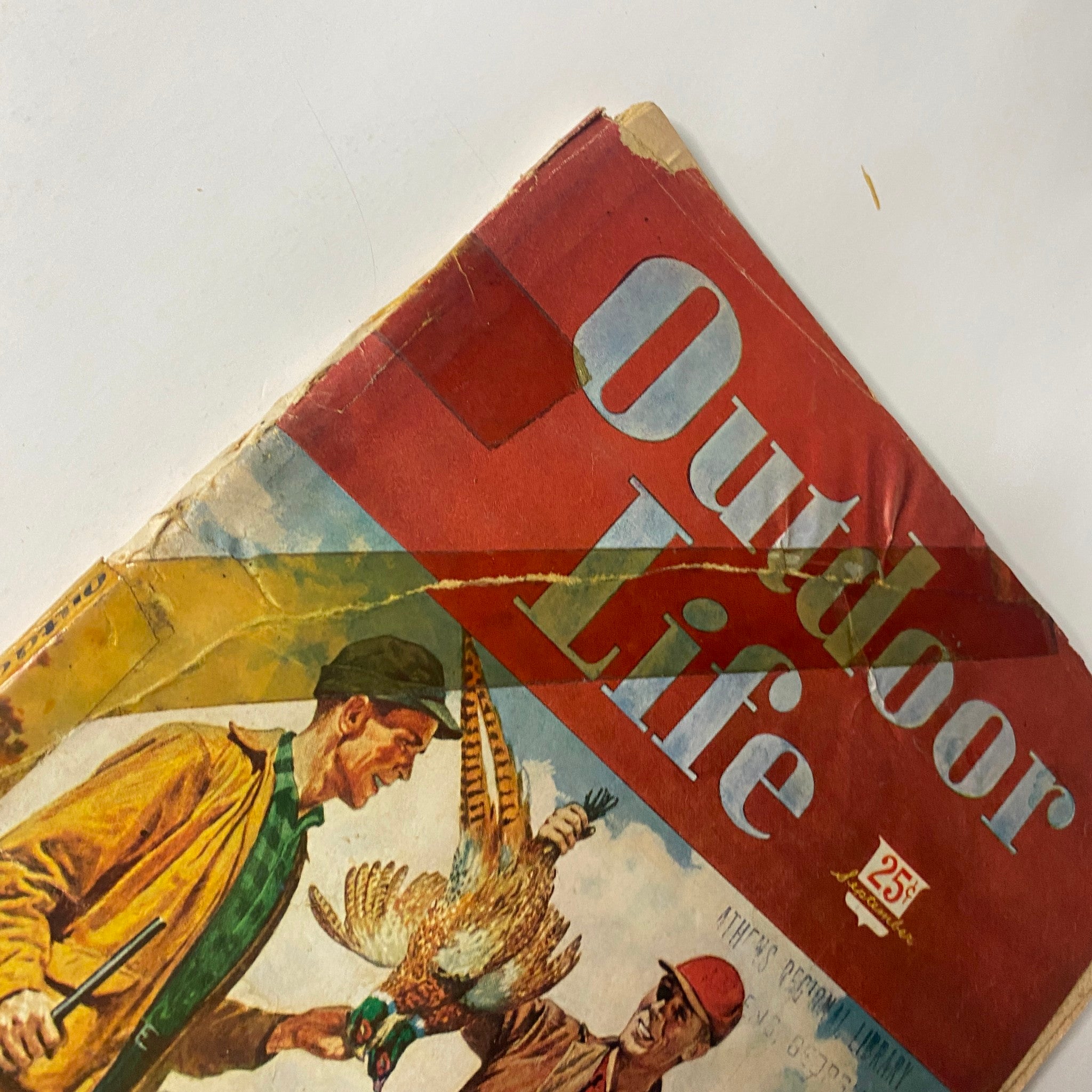 Close-up of the cover of Outdoor Life Magazine, September 1947 showing a detailed view of the painting by Ralph Crosby Smith of men and a turkey.