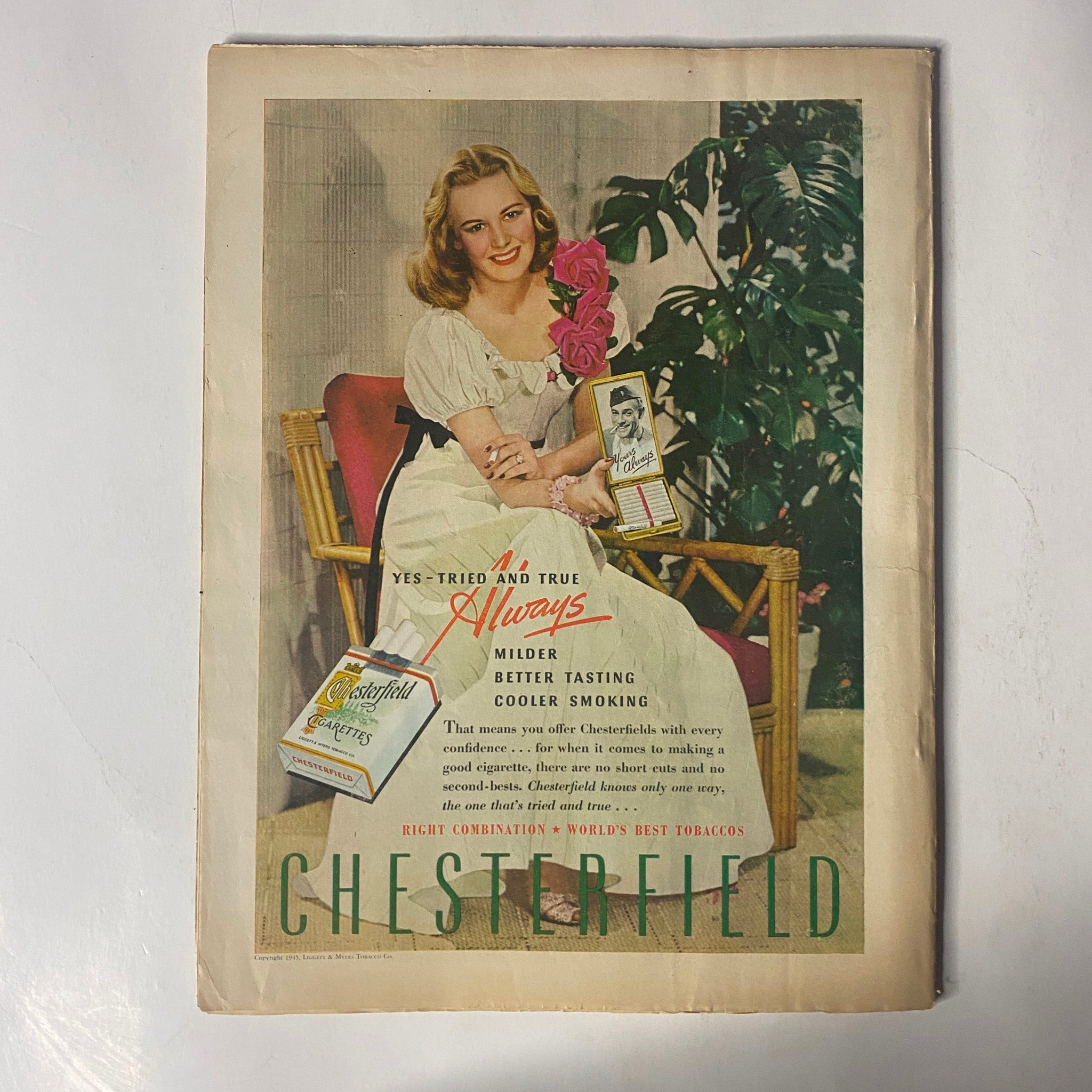 Vintage advertisement on the back cover of Radio Romances Magazine July 1945 promoting Chesterfield cigarettes, featuring a young woman in a white dress.