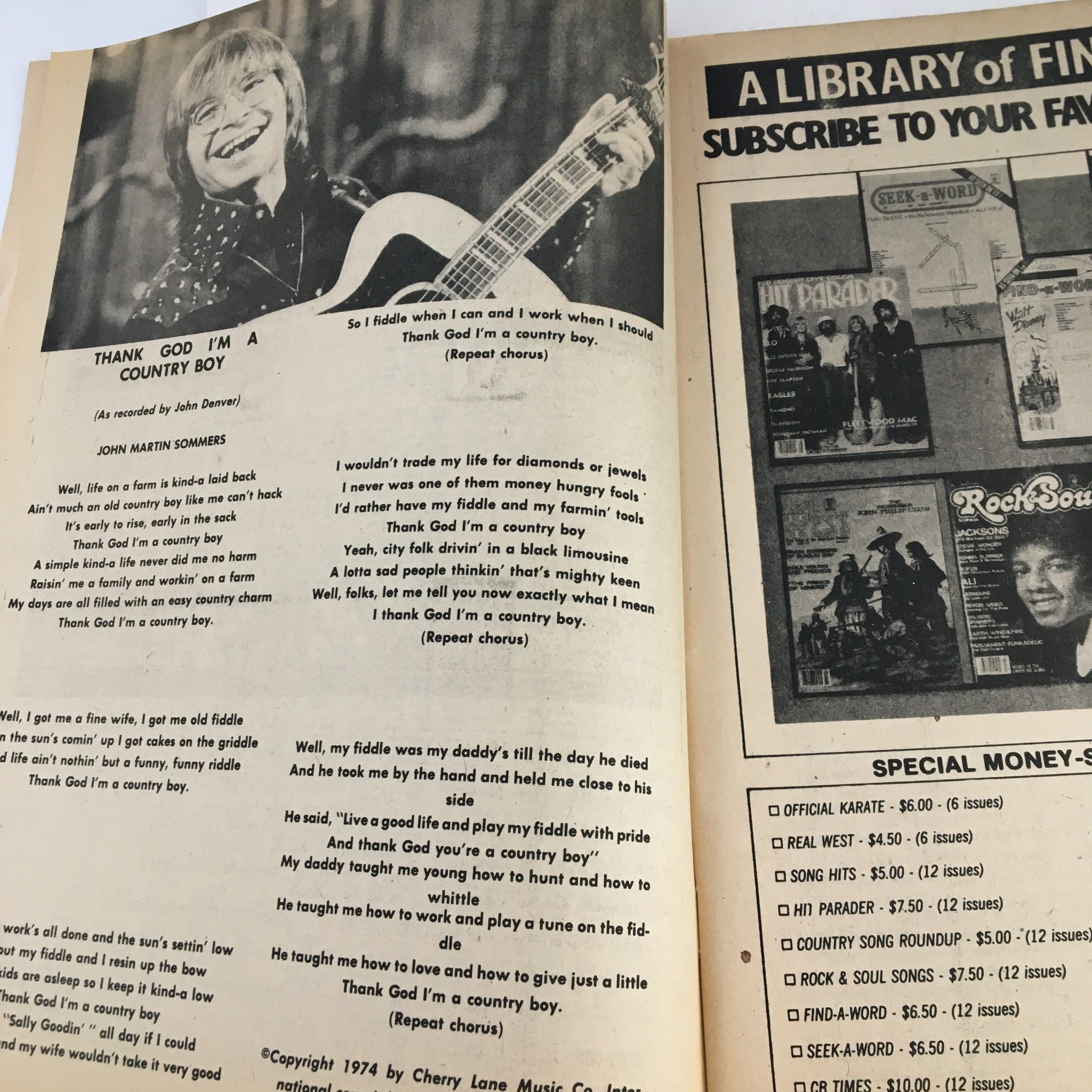 Lyrics page from 'Country Hits of the Seventies Summer 1977' featuring the song 'Thank God I'm a Country Boy' by John Denver, highlighting popular songs of the era.