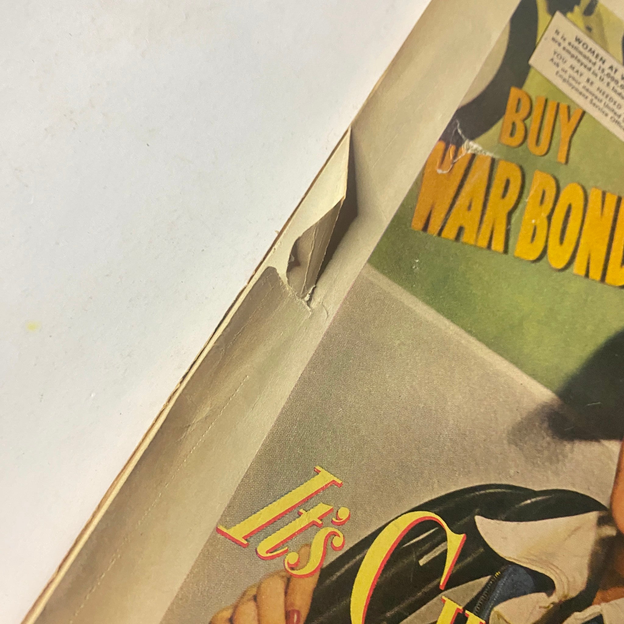 Detail of the vintage Chesterfield advertisement in Radio Mirror Magazine March 1943 showing a woman with a cigarette.