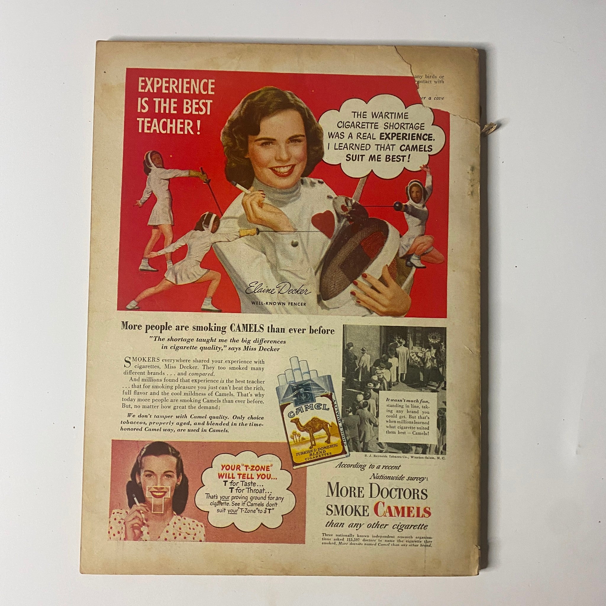 Back cover of the Field & Stream Magazine August 1947 featuring a vintage advertisement for Camel cigarettes, highlighting wartime advertising themes.