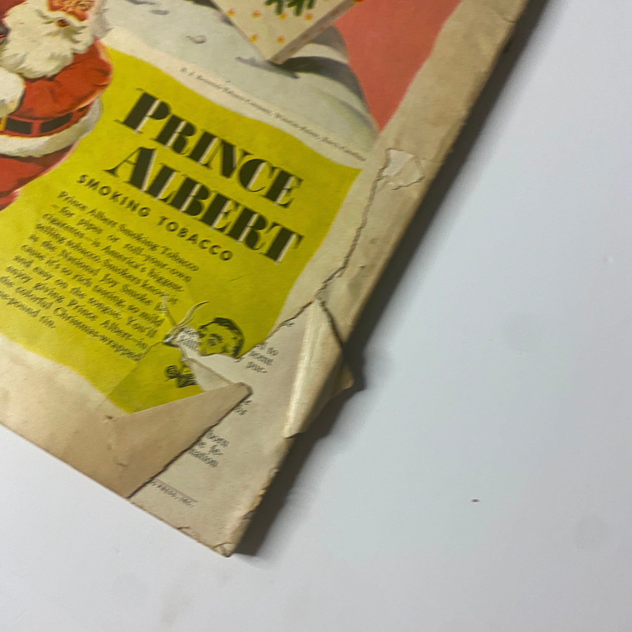 Close-up of the Field & Stream Magazine December 1947 Special Christmas Issue cover highlighting the Prince Albert Smokin Tobacco advertisement with Santa Claus.