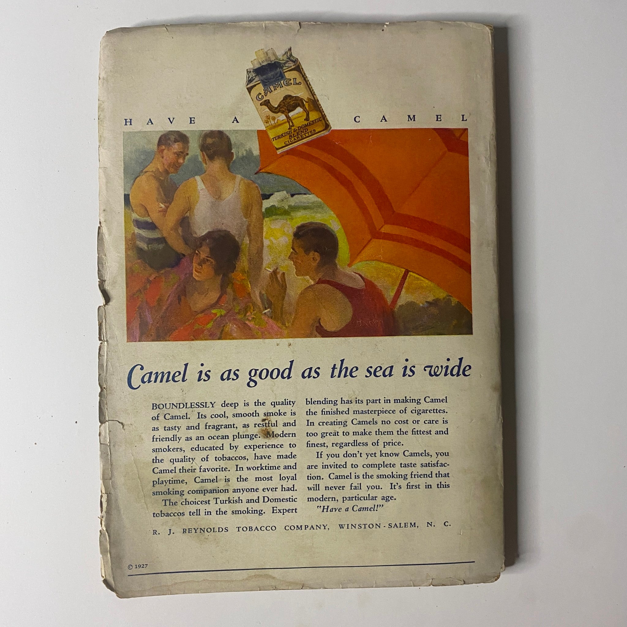 Back cover of Ranch Romances Pulp Magazine, September 1927, with an advertisement for Camel cigarettes and a colorful illustration promoting the brand.