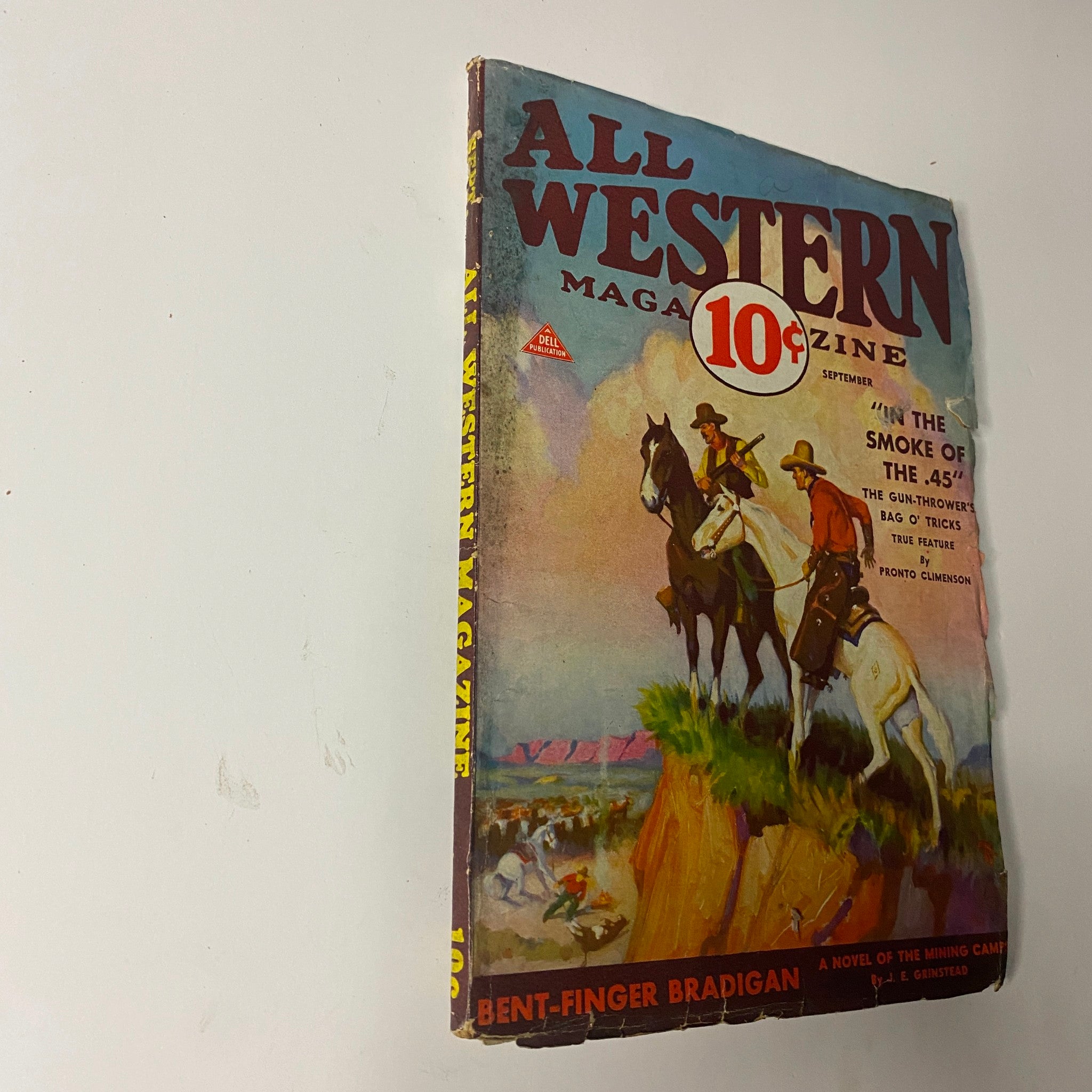 Another view of the September 1932 All Western Magazine cover with the title ‘In The Smoke of the .45’, showcasing cowboy characters.