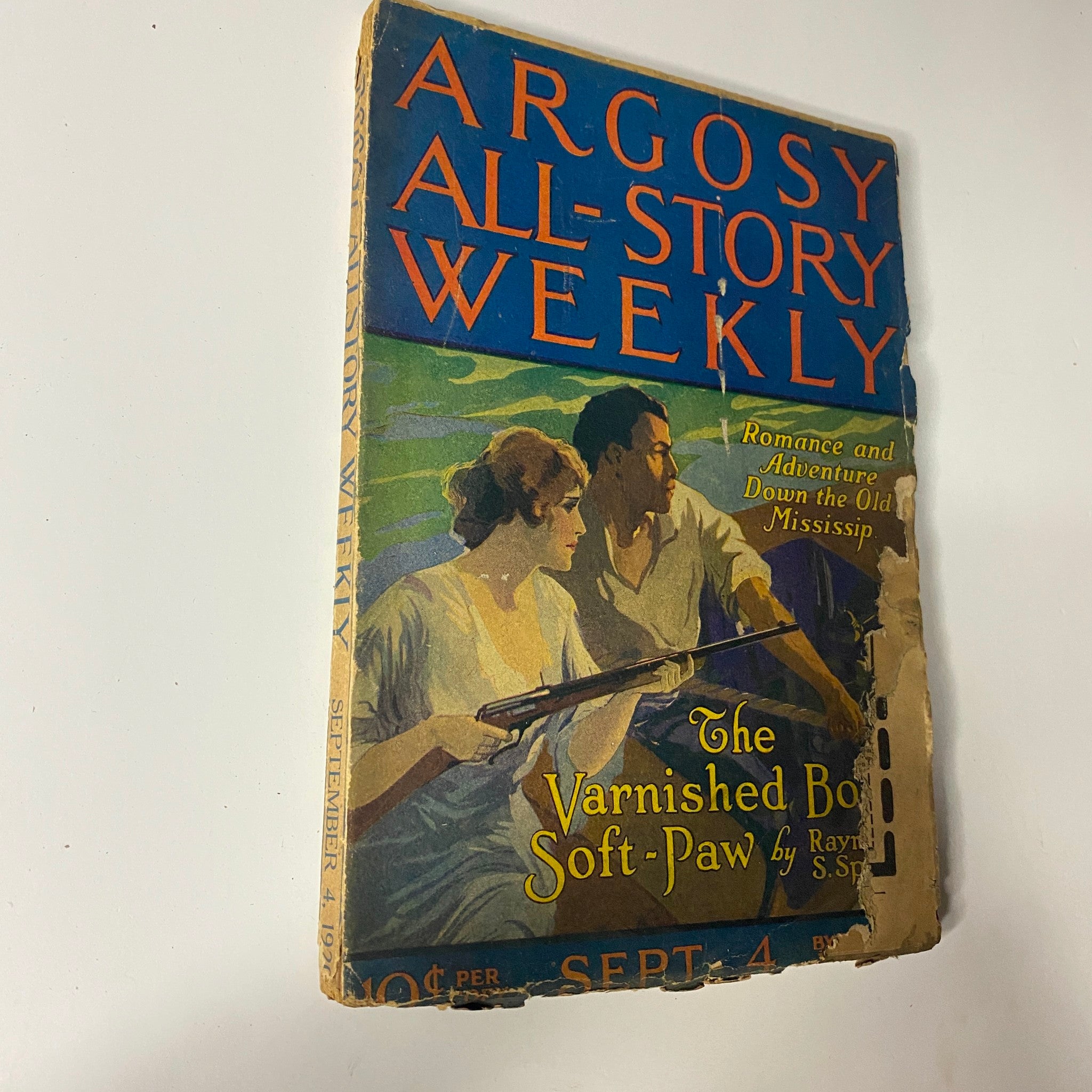 Another view of the Argosy All-Story Weekly magazine cover from September 4, 1920, highlighting the title 'The Varnished Boat Soft-Paw' by Raymond S. Spears, with details of romance and adventure.