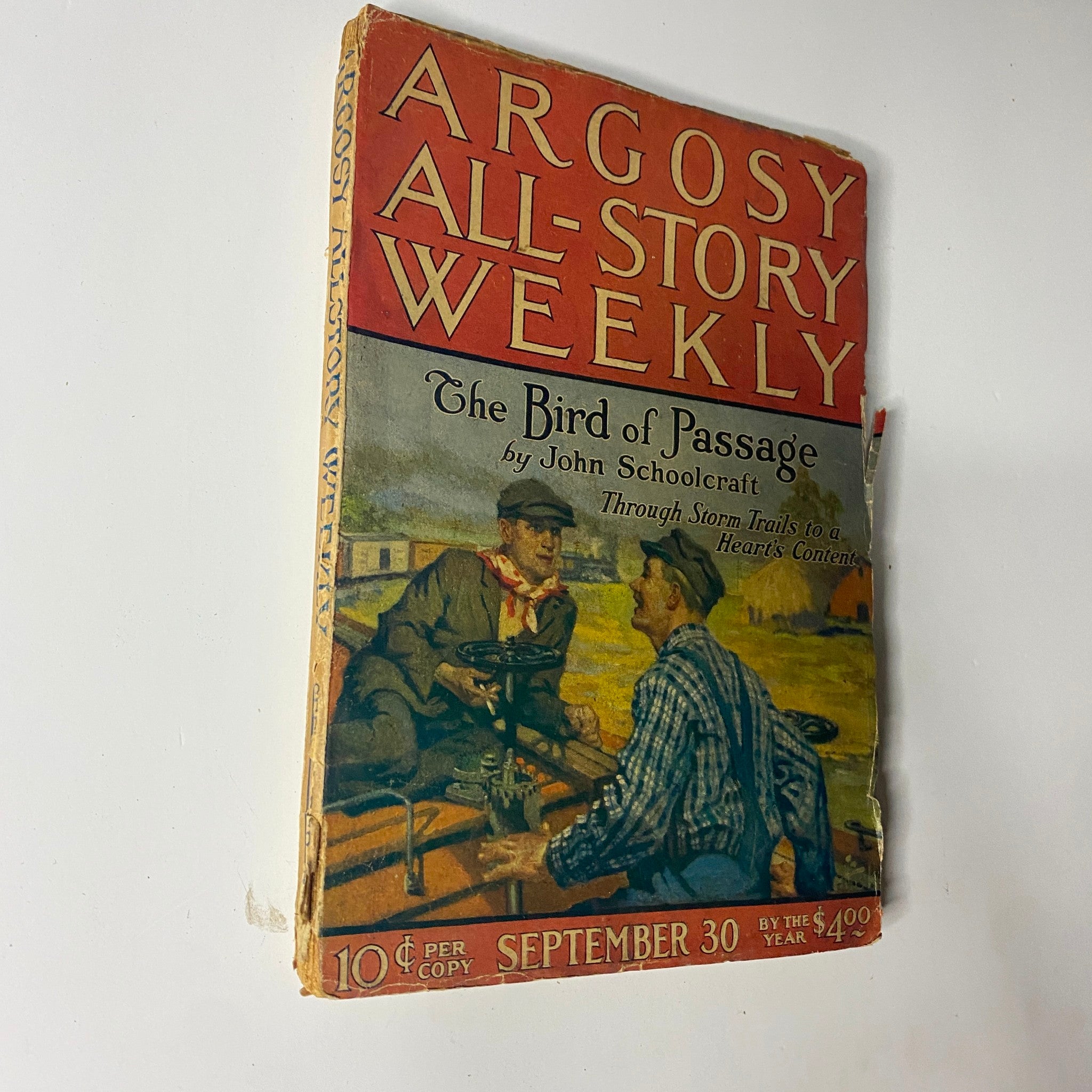 Another view of the cover of Argosy All-Story Weekly, September 30, 1922, displaying 'The Bird of Passage' by John Schoolcraft, with a focus on the vibrant colors and artistic design.