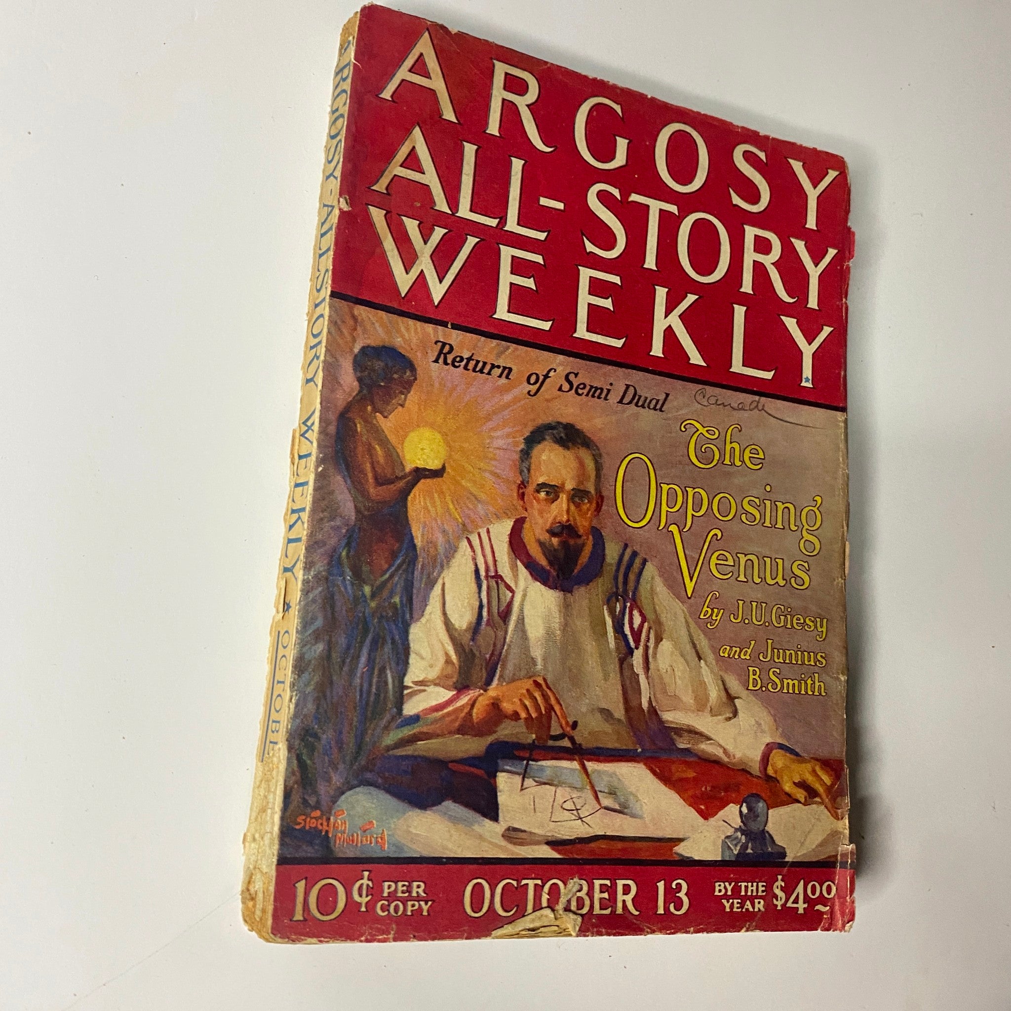 Close-up view of the cover of Argosy All-Story Weekly, October 13, 1923, highlighting the title 'The Opposing Venus' by J.U. Giesy and Junius B. Smith, with distinct pulp magazine artwork.