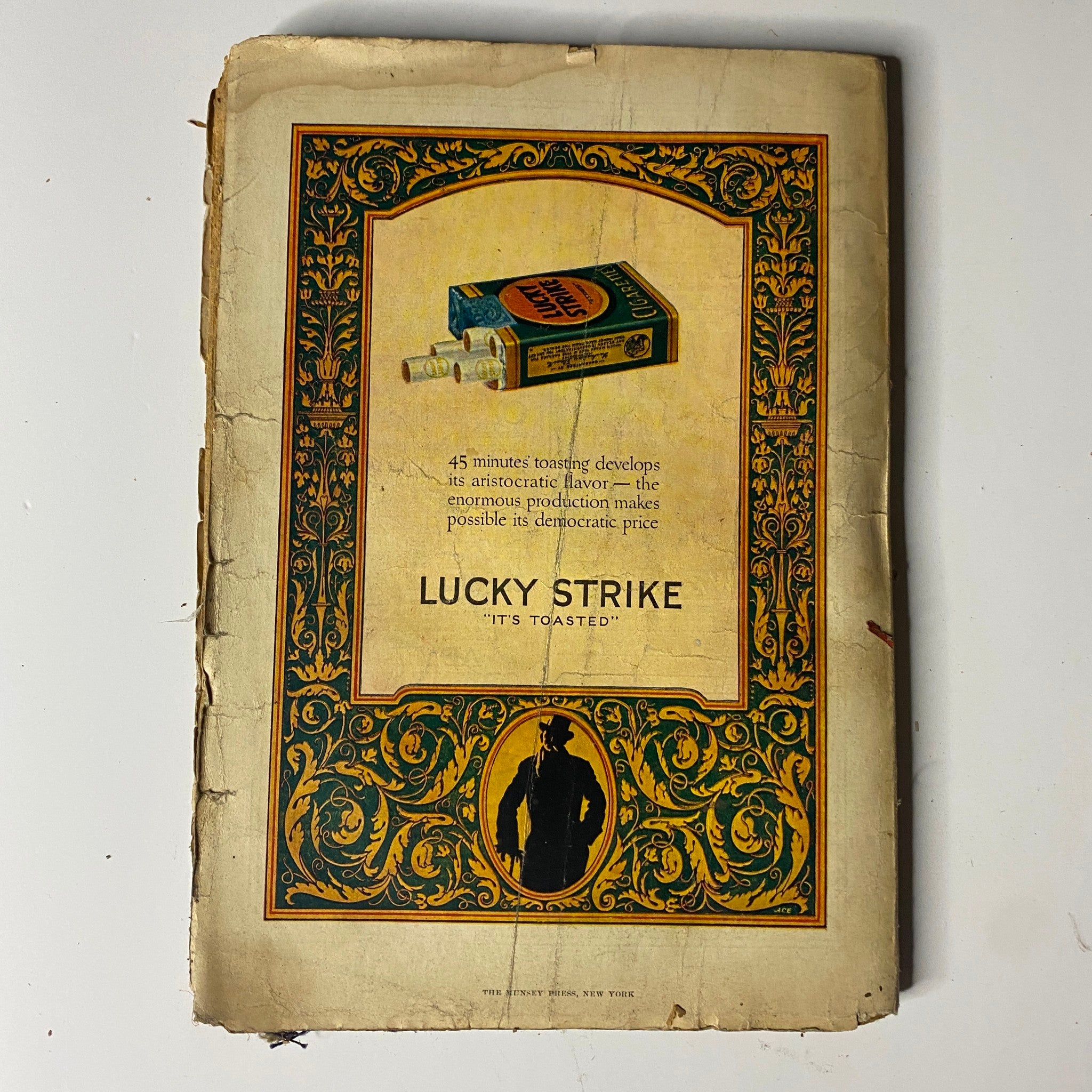 Cover of the Argosy All-Story Weekly Pulp Magazine, July 19, 1924, featuring the title 'Channing Comes Through' with a vintage advertisement for Lucky Strike cigarettes, showcasing intricate floral designs and a silhouette.