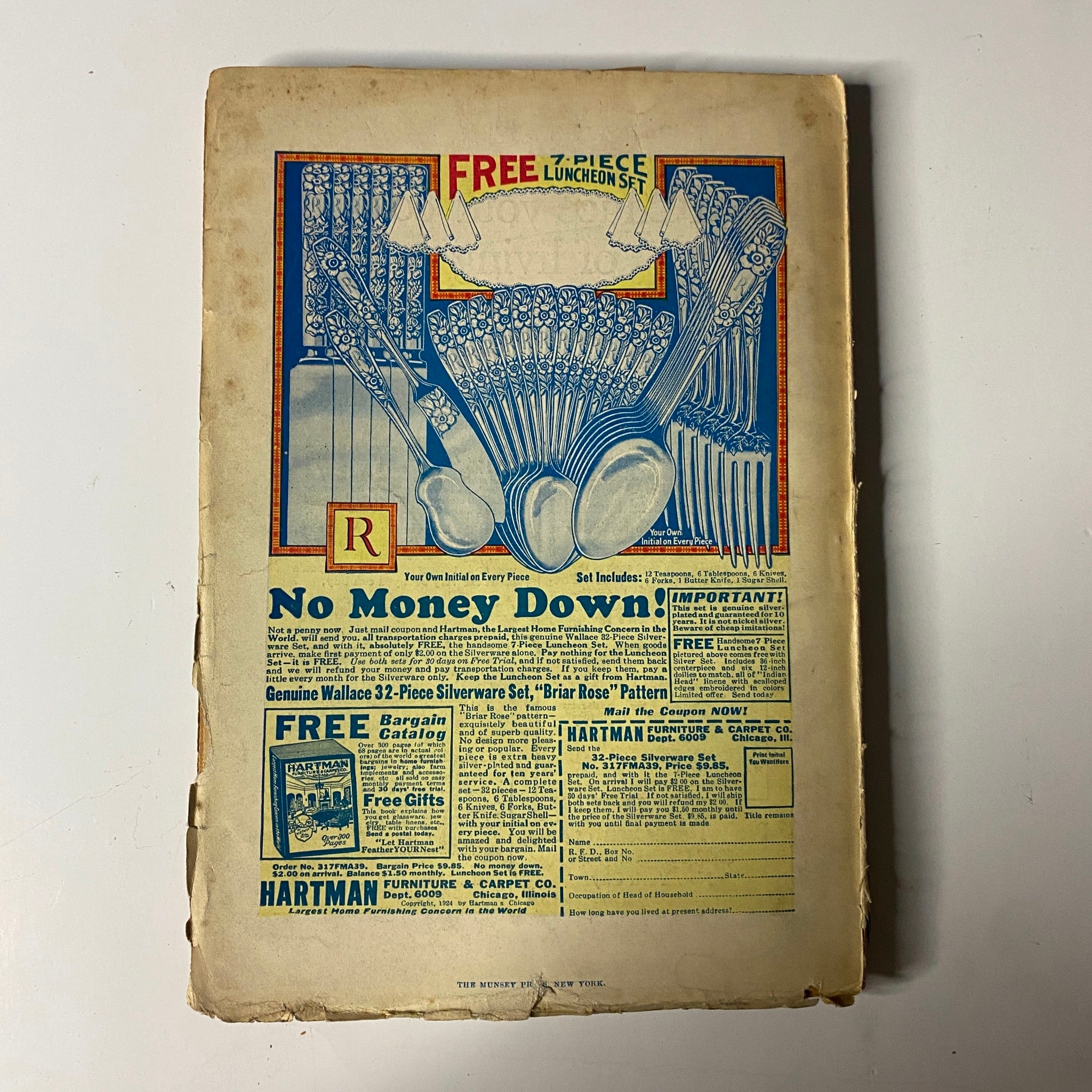 Vintage advertisement from the Argosy All-Story Weekly pulp magazine dated January 19, 1924, showcasing dining accessories with the title 'FREE 32-Piece Luncheon Set'. The ad highlights a promotion and includes illustrations of silverware and dishes, representing the style and marketing of the early 20th century periodical.