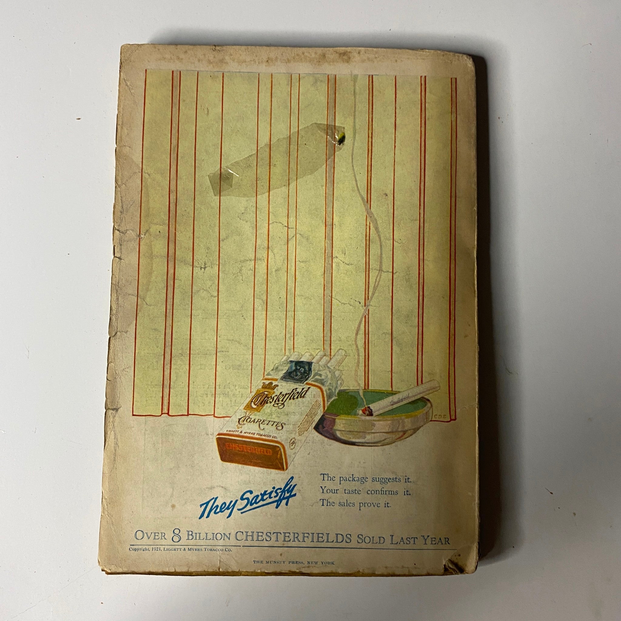 Back cover of Argosy All-Story Weekly Pulp Magazine from March 10, 1923, showing an advertisement with a minimalist design featuring a bowl and Chesterfield cigarette package.